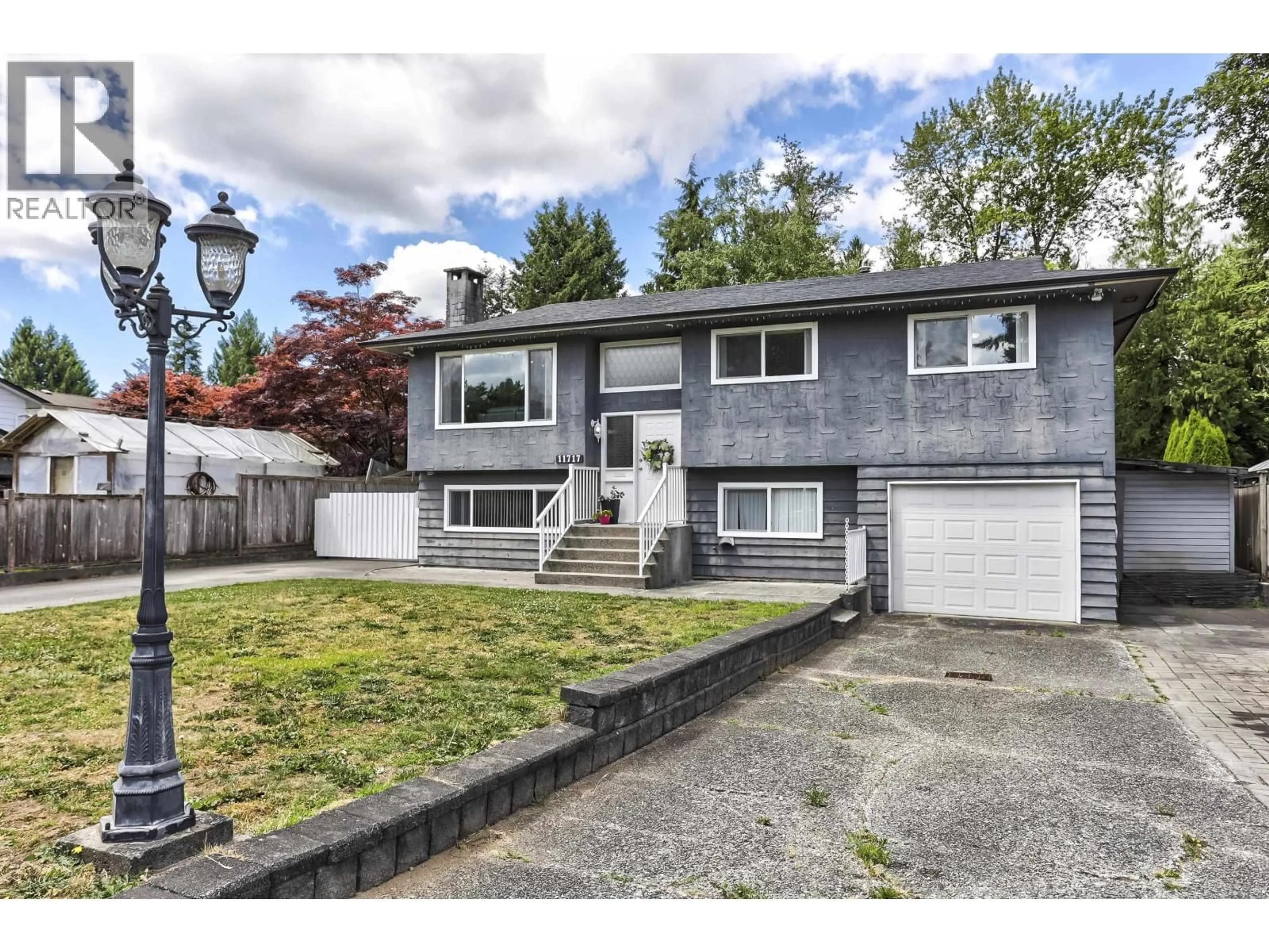 Home with vinyl exterior material, street for 11717 209 STREET, Maple Ridge British Columbia V2X7S6