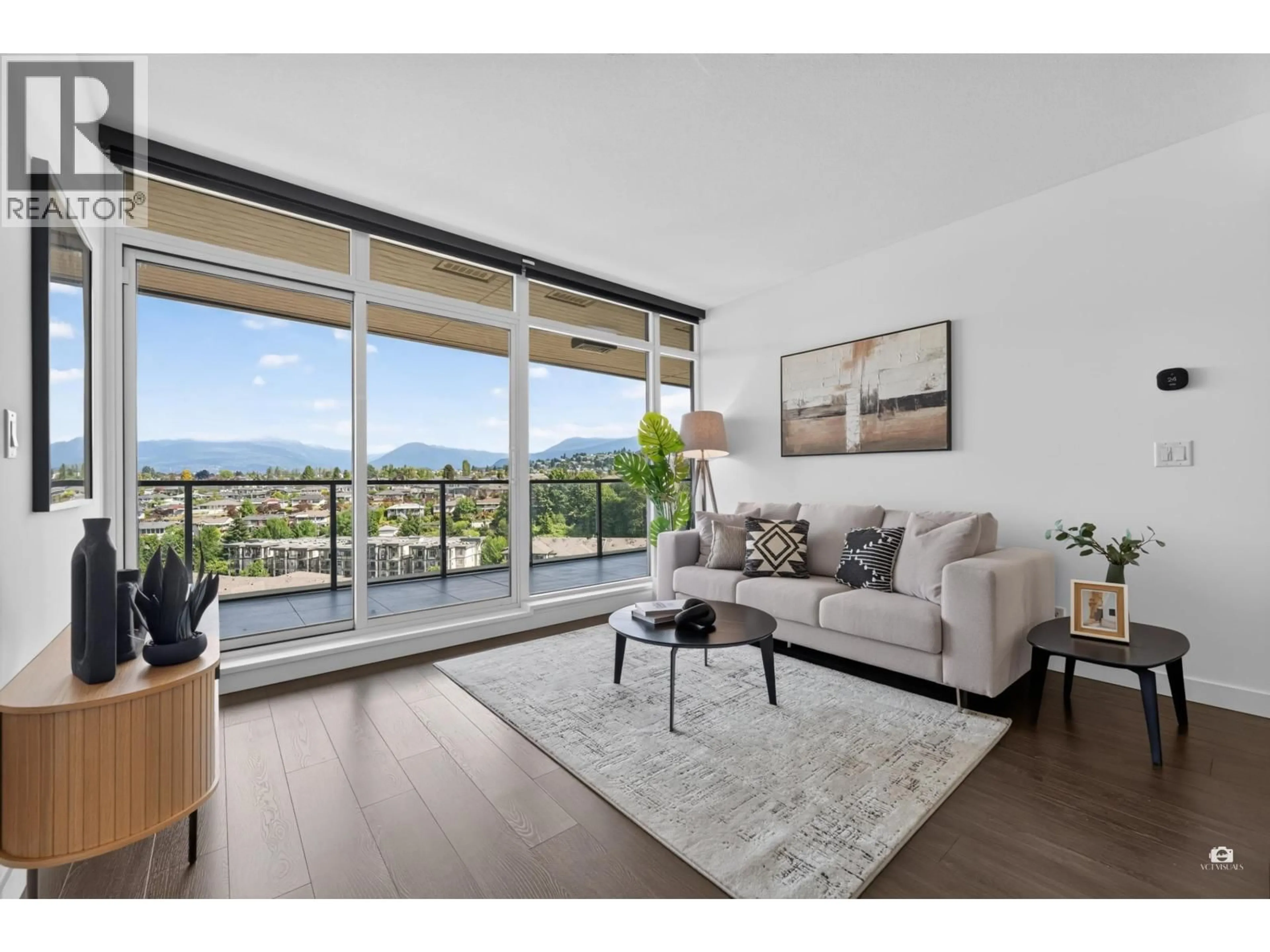 Living room with furniture, wood/laminate floor for 1403 - 4880 LOUGHEED HIGHWAY, Burnaby British Columbia V5C0N1