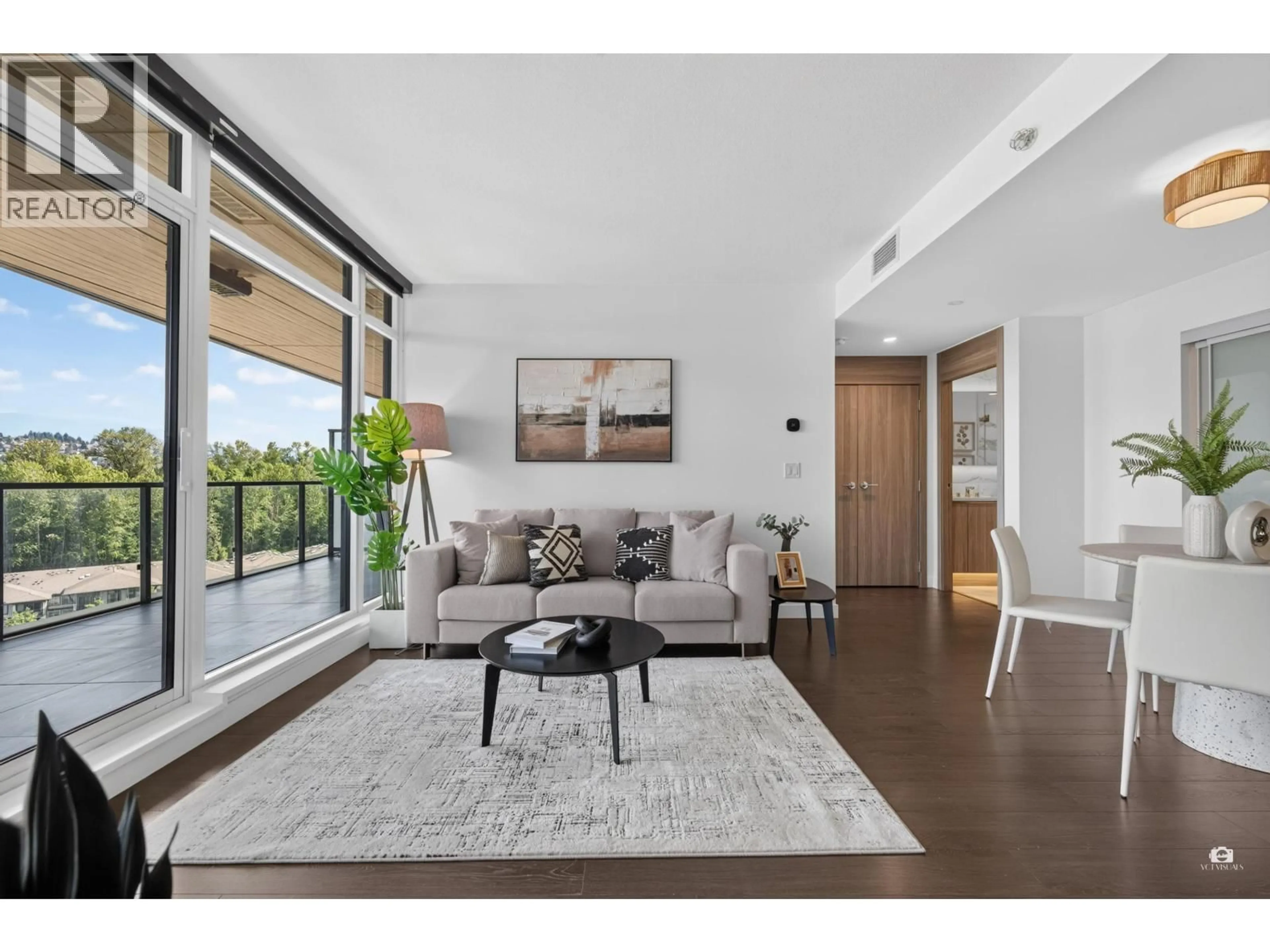 Living room with furniture, wood/laminate floor for 1403 - 4880 LOUGHEED HIGHWAY, Burnaby British Columbia V5C0N1