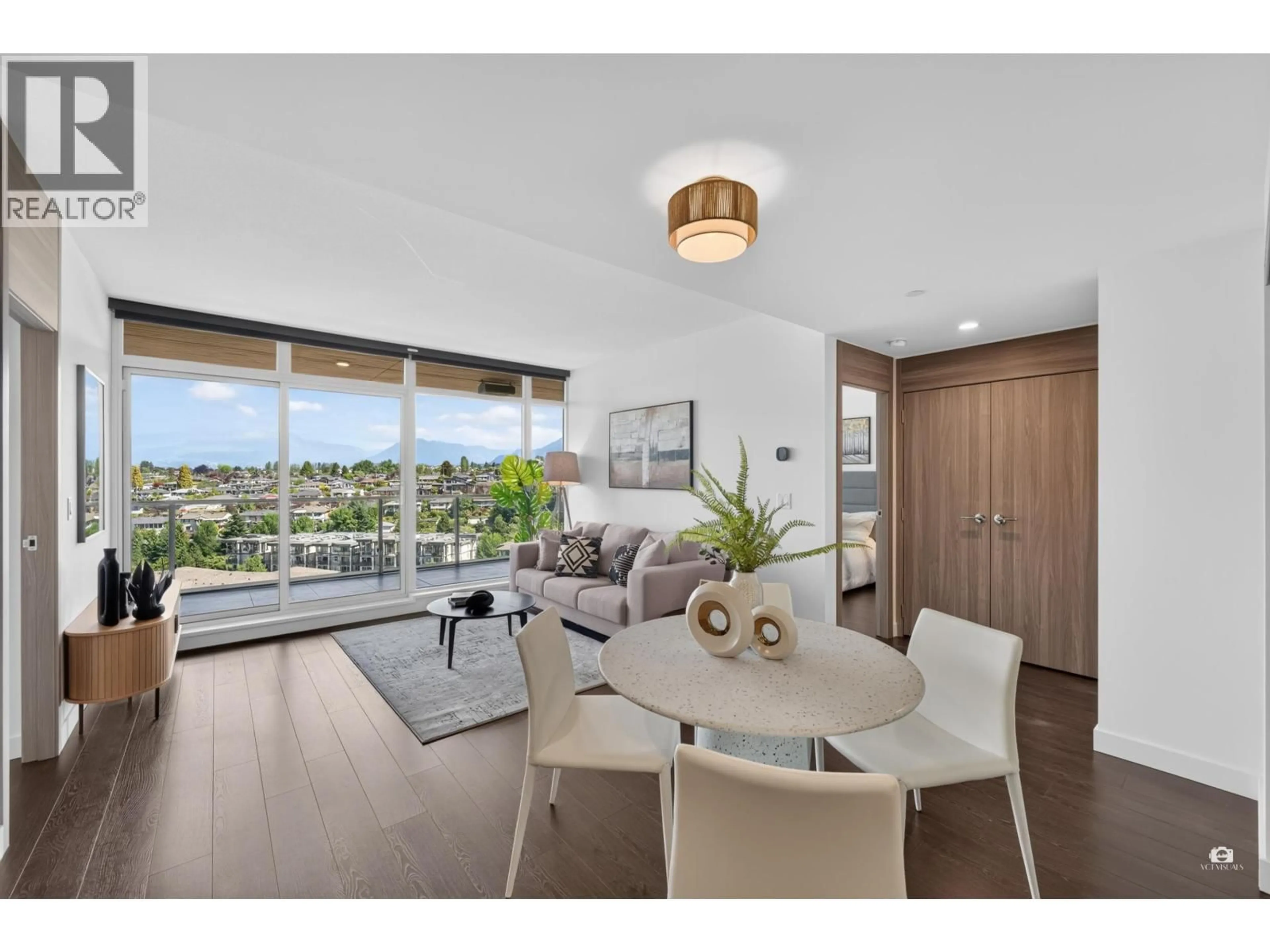 Living room with furniture, wood/laminate floor for 1403 - 4880 LOUGHEED HIGHWAY, Burnaby British Columbia V5C0N1