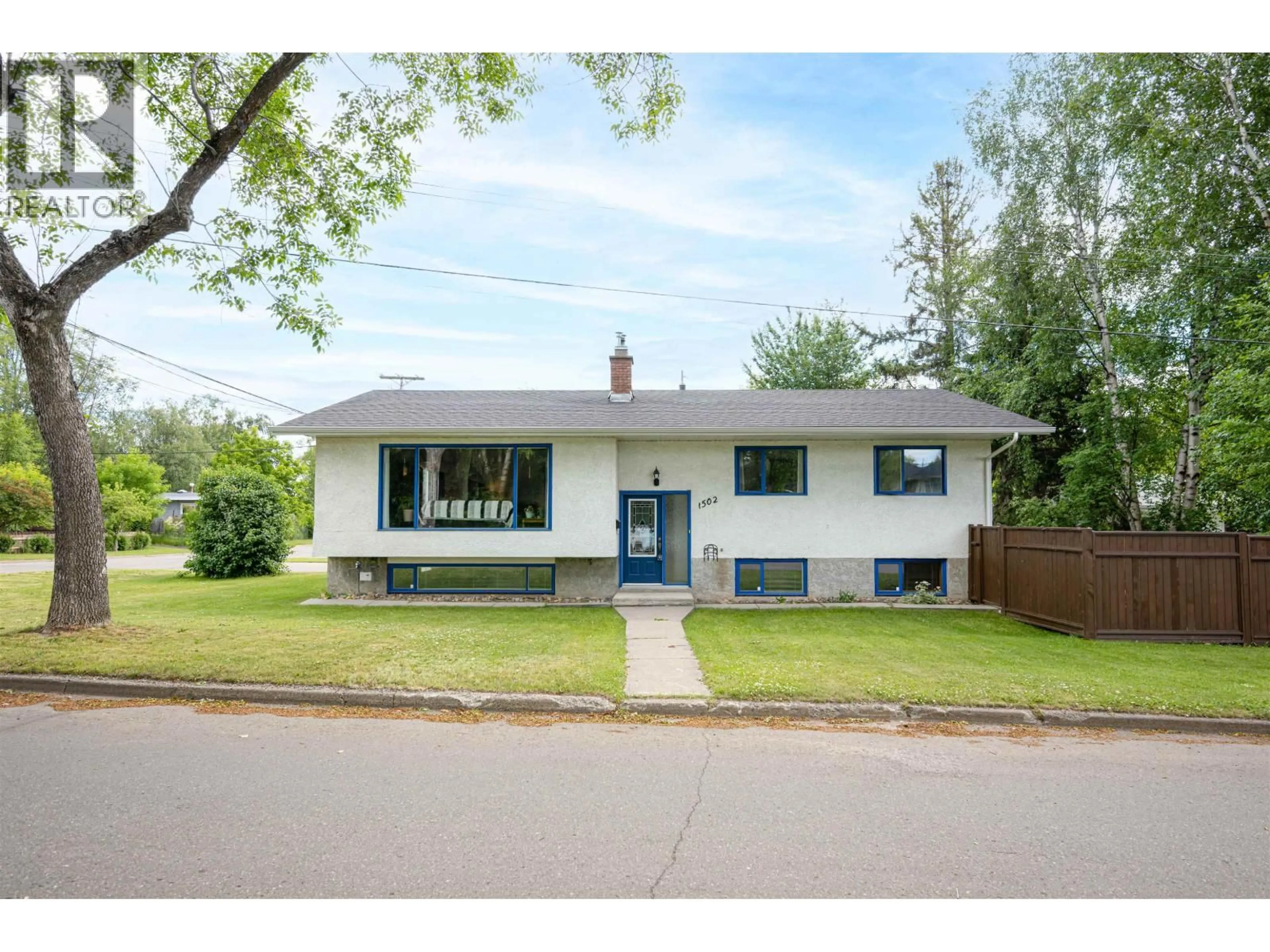 Home with vinyl exterior material, street for 1502 ASH STREET, Prince George British Columbia V2L5J7
