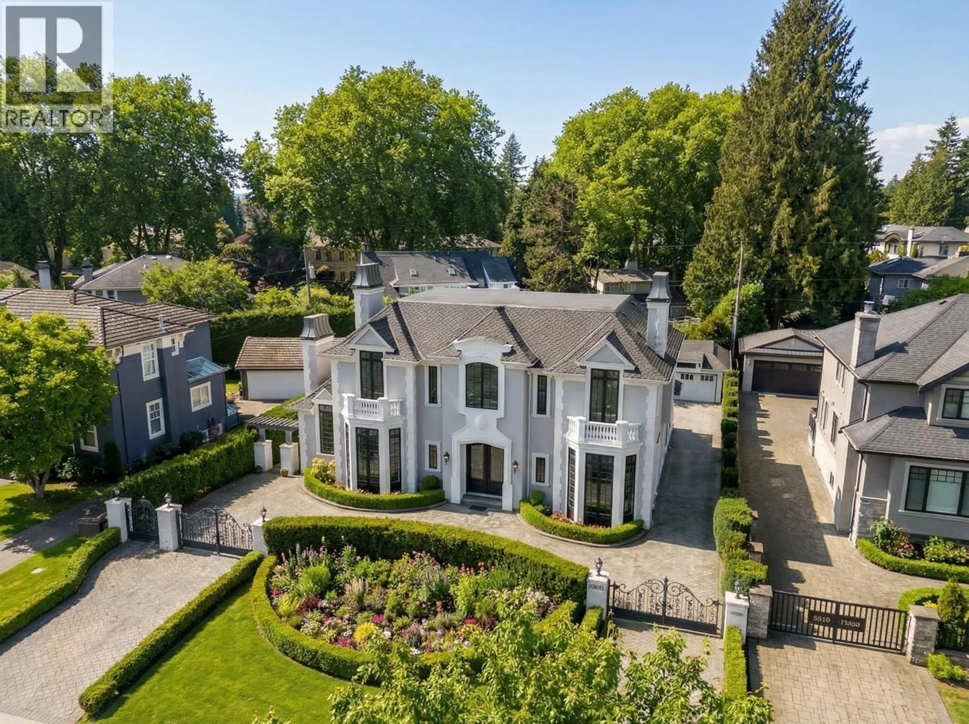 A pic from outside/outdoor area/front of a property/back of a property/a pic from drone, street for 8083 ANGUS DRIVE, Vancouver British Columbia V6P5K9