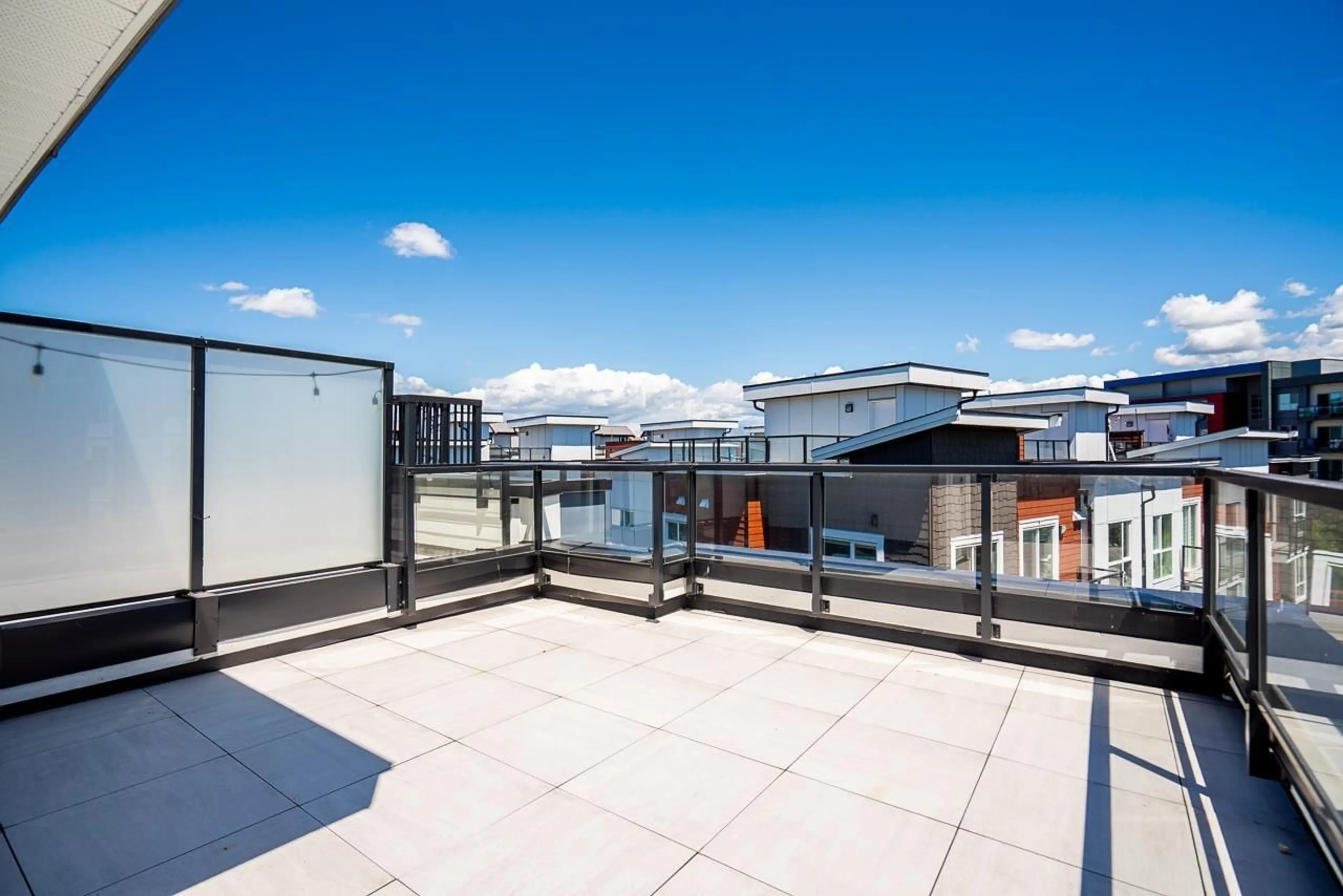 Patio, city buildings view from balcony for 30 - 5476 BRYDON CRESCENT, Langley British Columbia V3A0N7