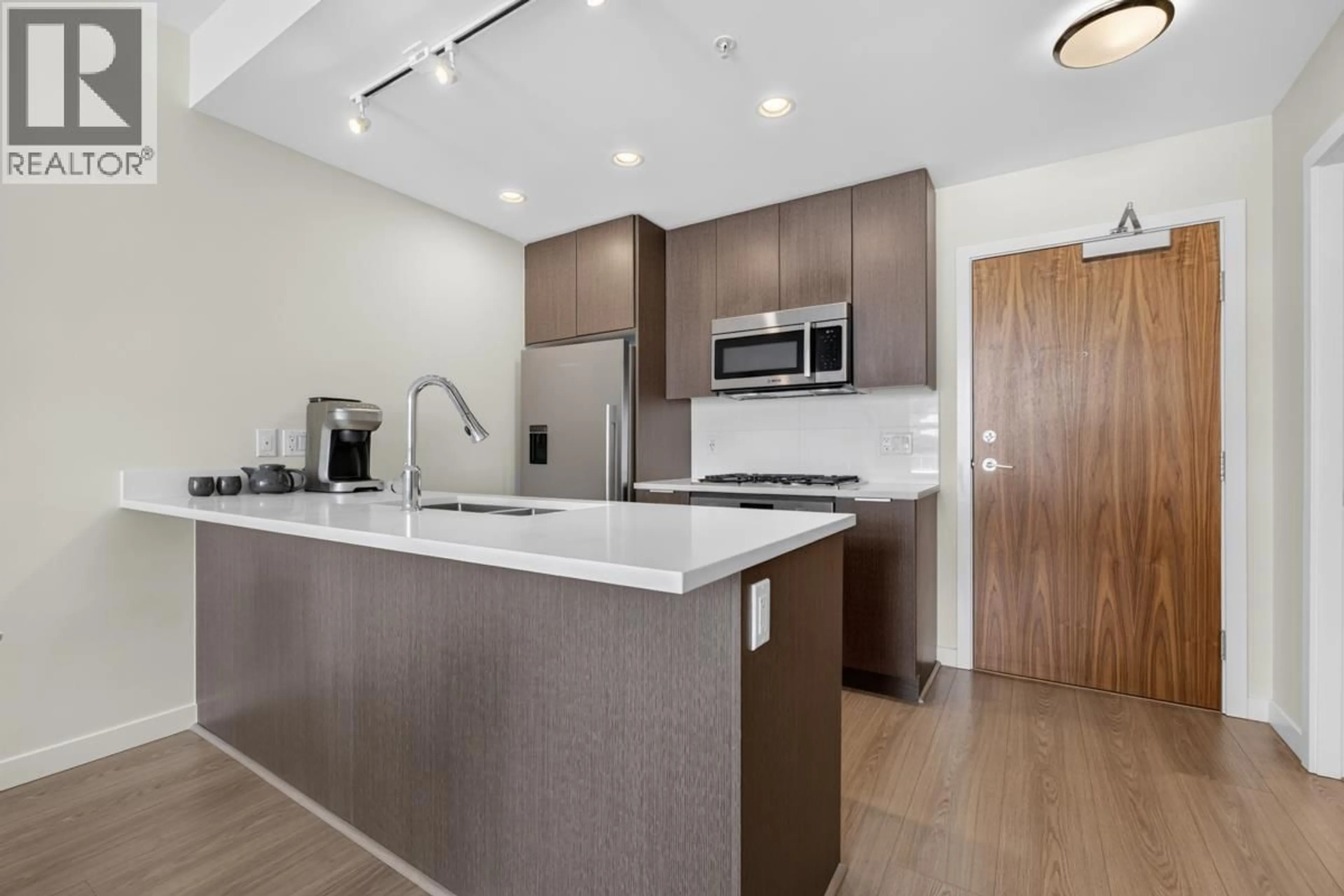 Open concept kitchen, unknown for 903 - 8699 HAZELBRIDGE WAY, Richmond British Columbia V6X0T4