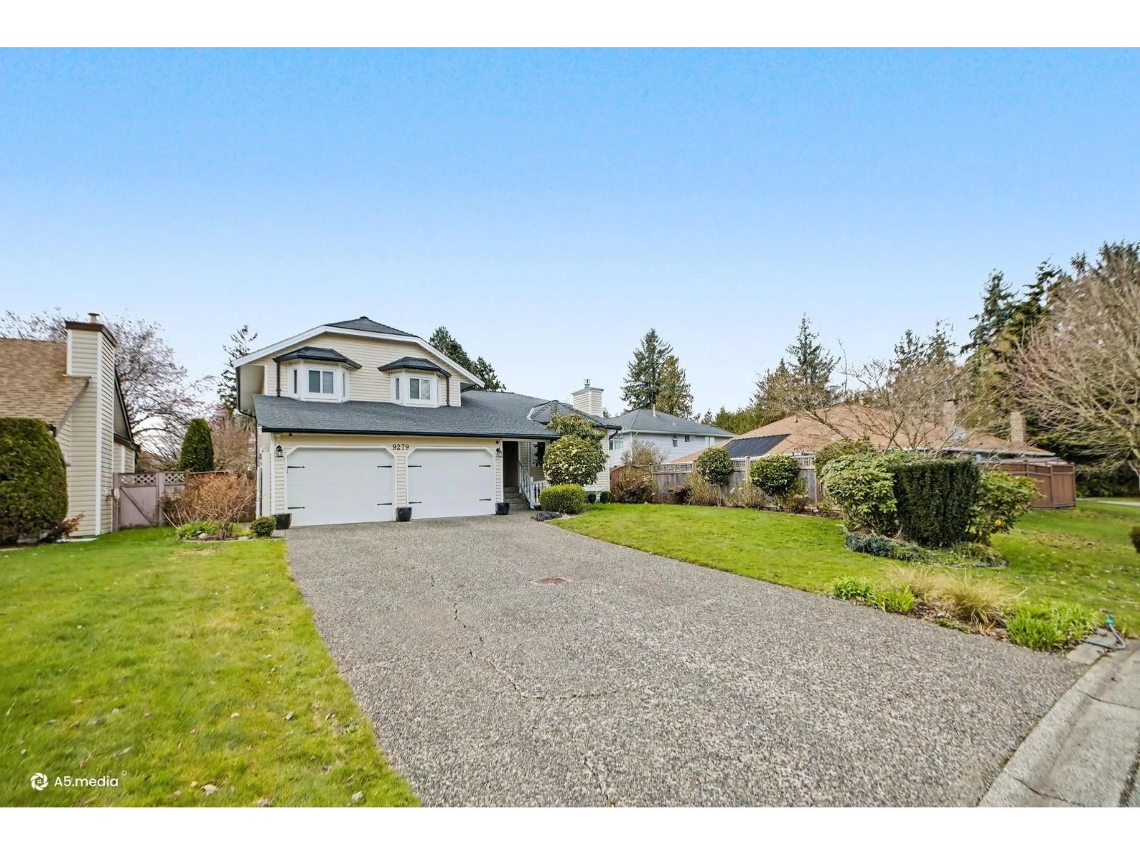 Home with vinyl exterior material, street for 9279 156A STREET, Surrey British Columbia V4N3B1