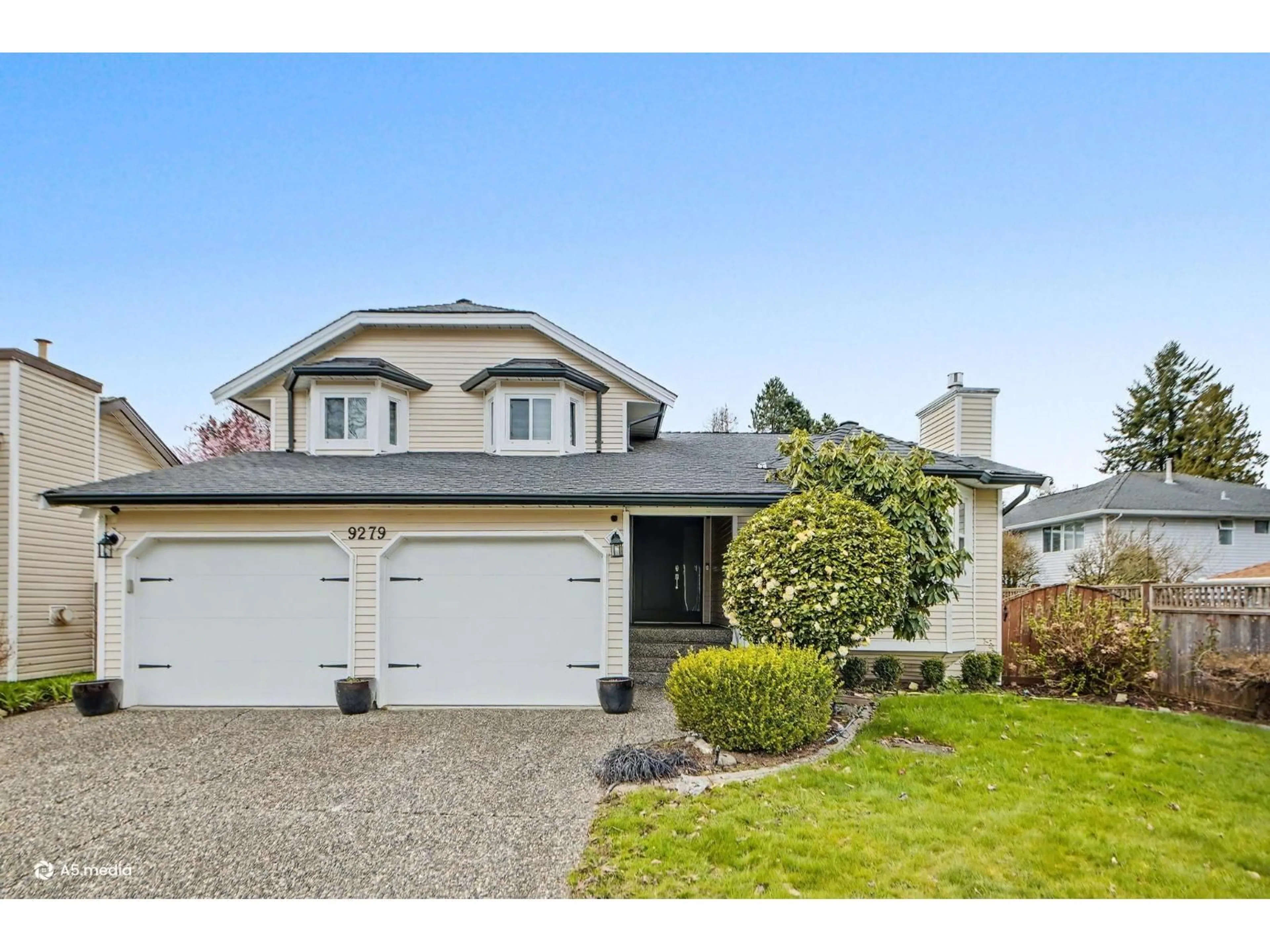 Home with vinyl exterior material, street for 9279 156A STREET, Surrey British Columbia V4N3B1