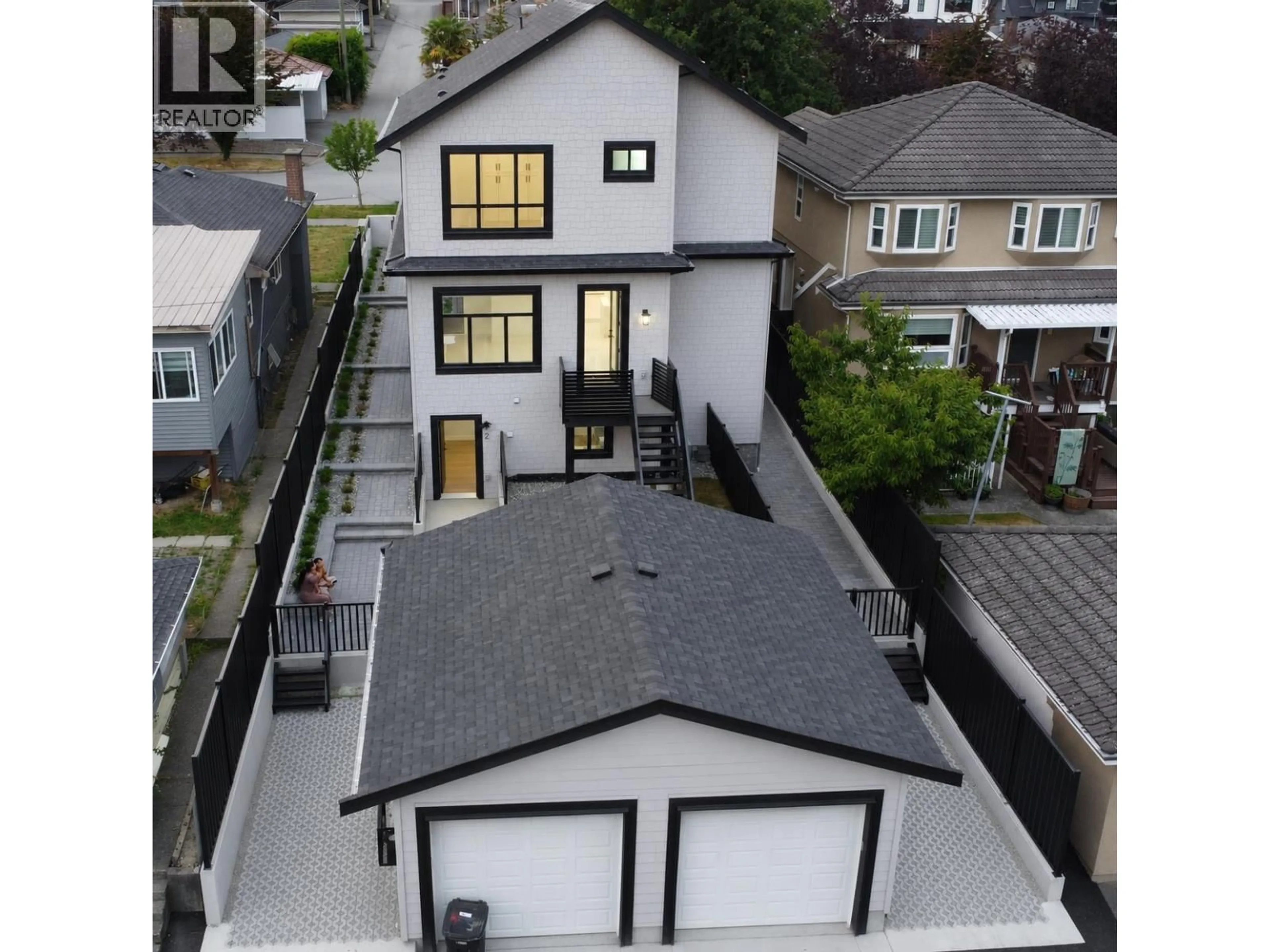 A pic from outside/outdoor area/front of a property/back of a property/a pic from drone, street for 1328 64TH AVENUE, Vancouver British Columbia V5X2P1