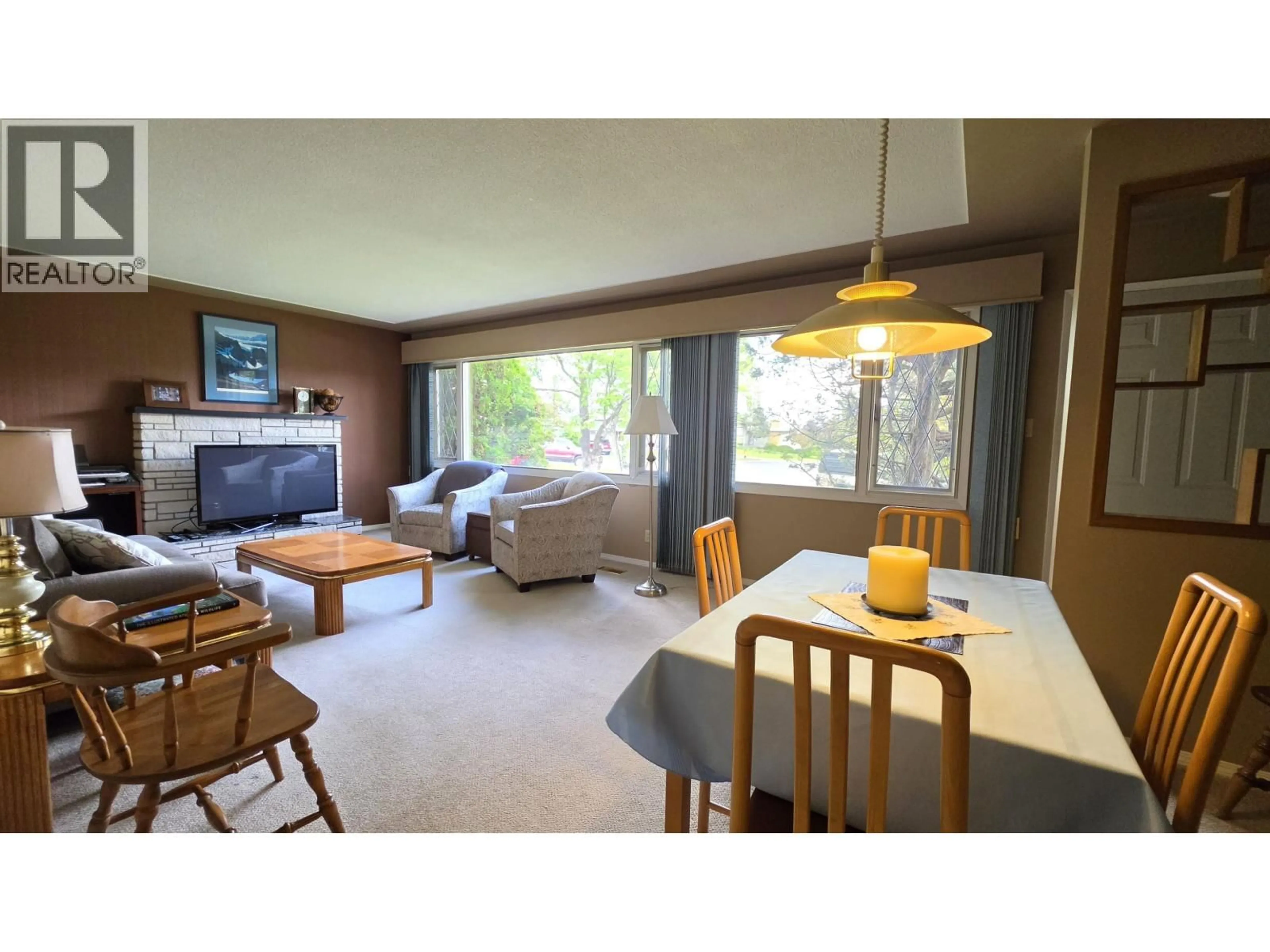 Living room with furniture, wood/laminate floor for 2730 EWERT CRESCENT, Prince George British Columbia V2M2S2