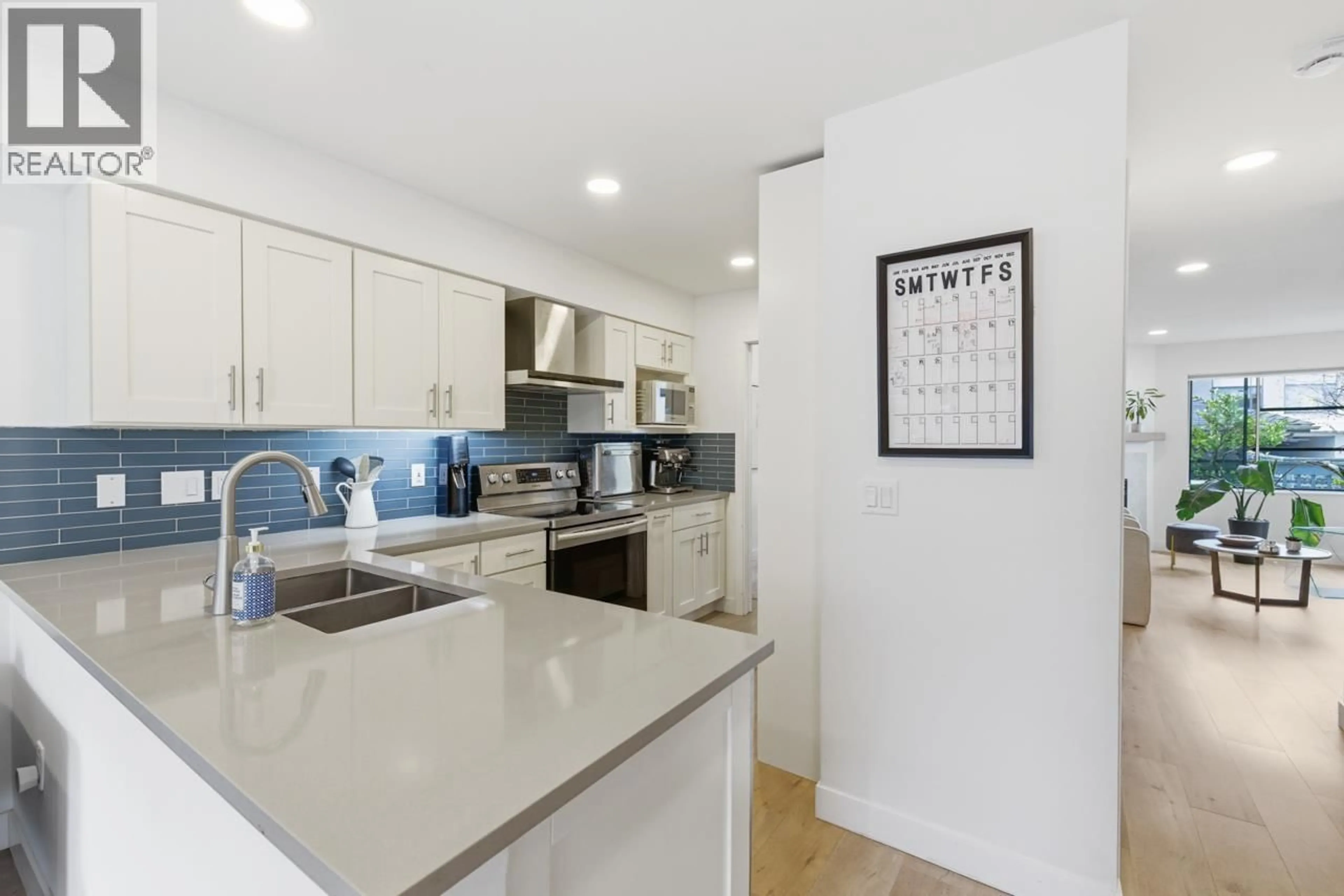 Open concept kitchen, ceramic/tile floor for 10 - 2118 EASTERN AVENUE, North Vancouver British Columbia V7L3G3
