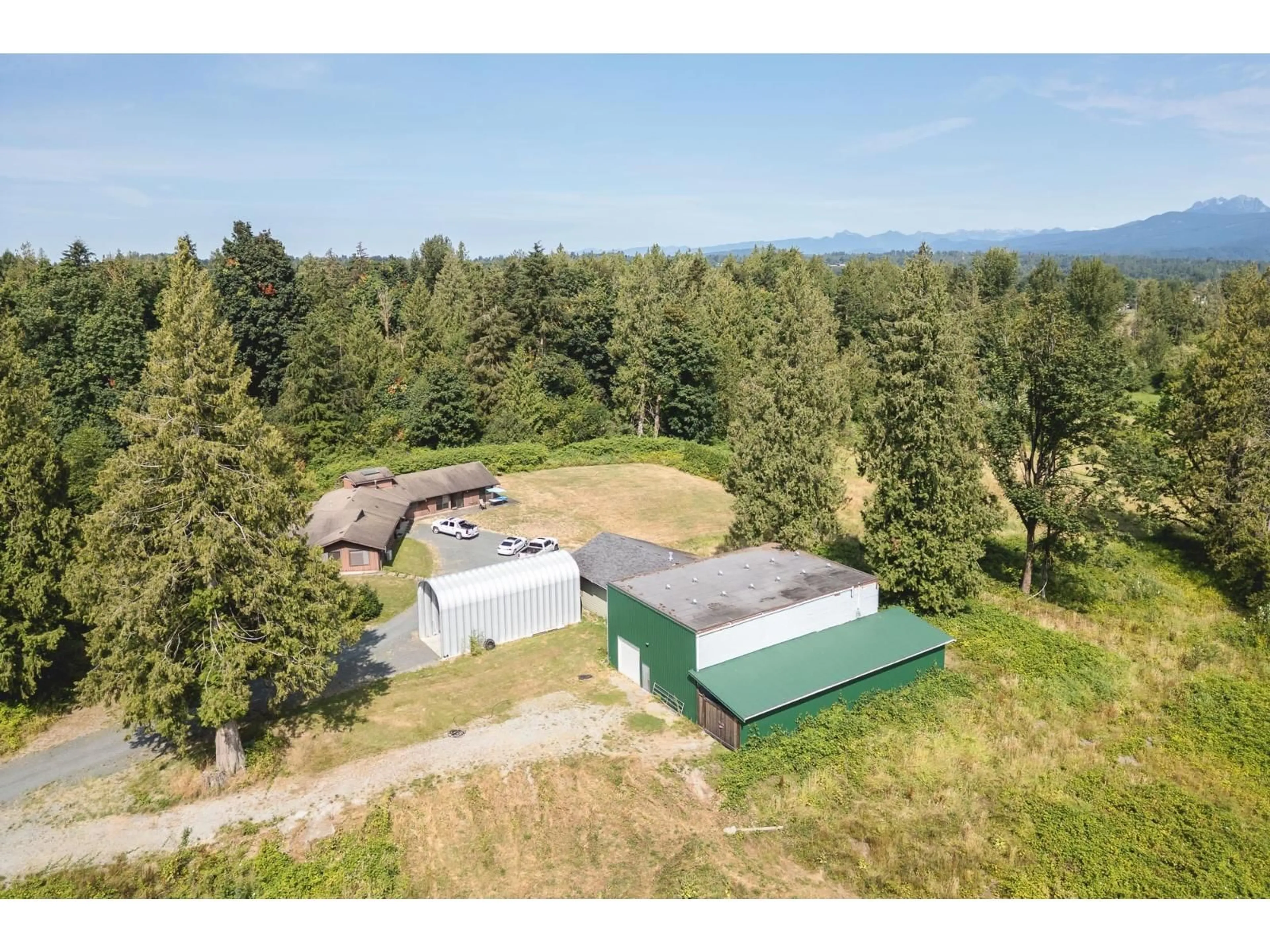 A pic from outside/outdoor area/front of a property/back of a property/a pic from drone, mountain view for 30211 BURGESS AVENUE, Abbotsford British Columbia V4X1V5