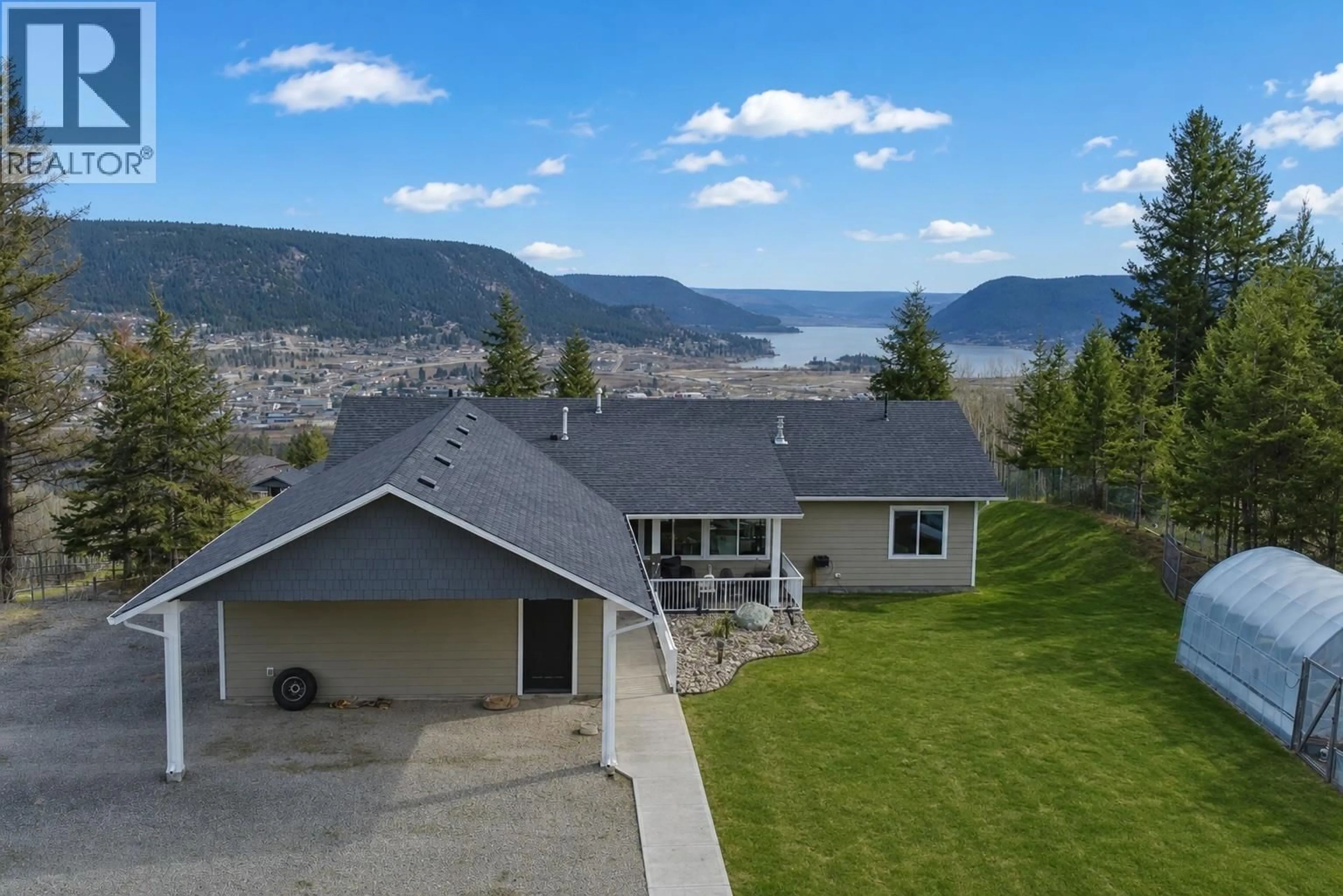 A pic from outside/outdoor area/front of a property/back of a property/a pic from drone, water/lake/river/ocean view for 266 WOODLAND DRIVE, Williams Lake British Columbia V2G4P9