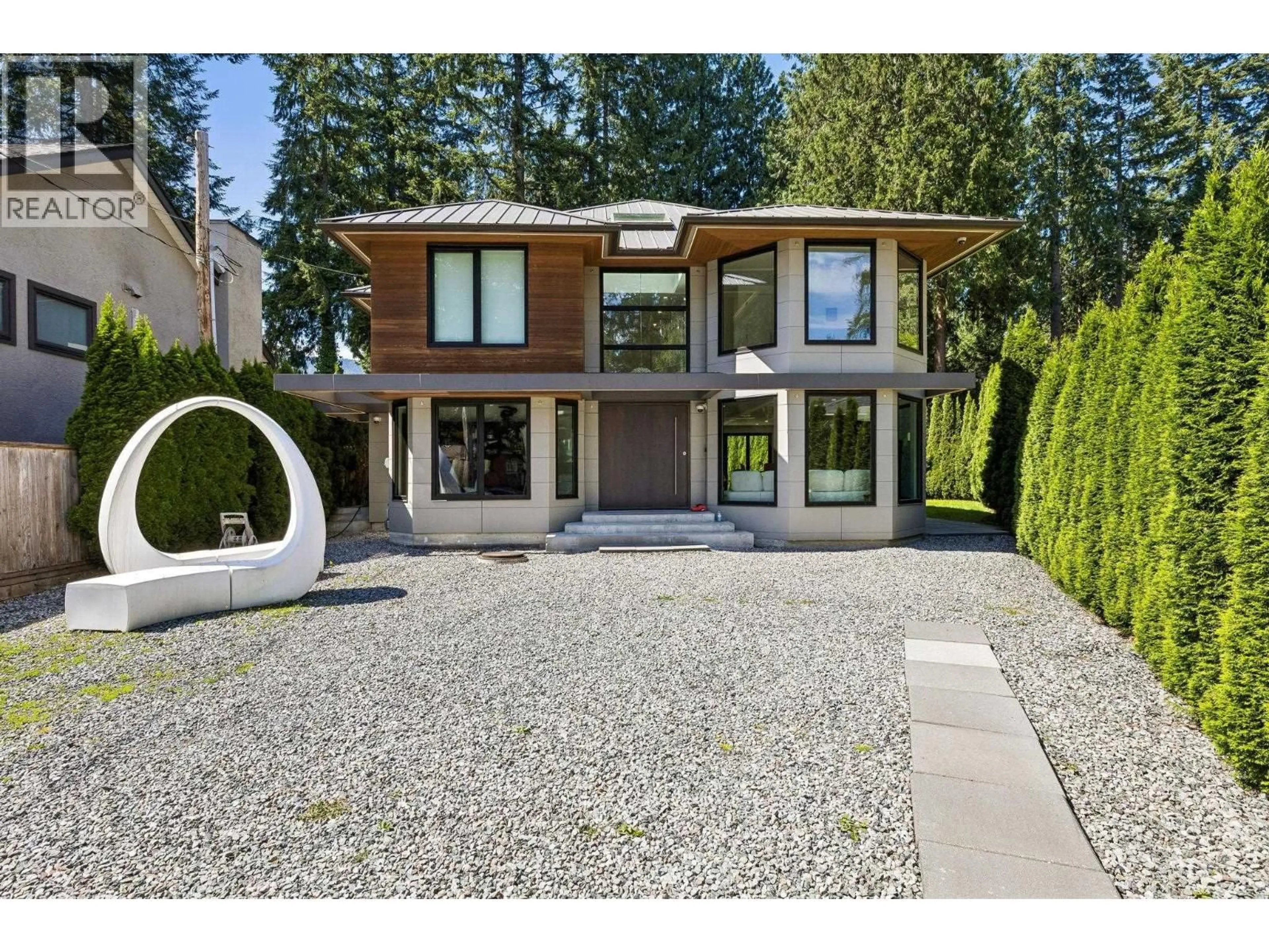 Home with brick exterior material, street for 4577 CAPILANO ROAD, North Vancouver British Columbia V7R4K2