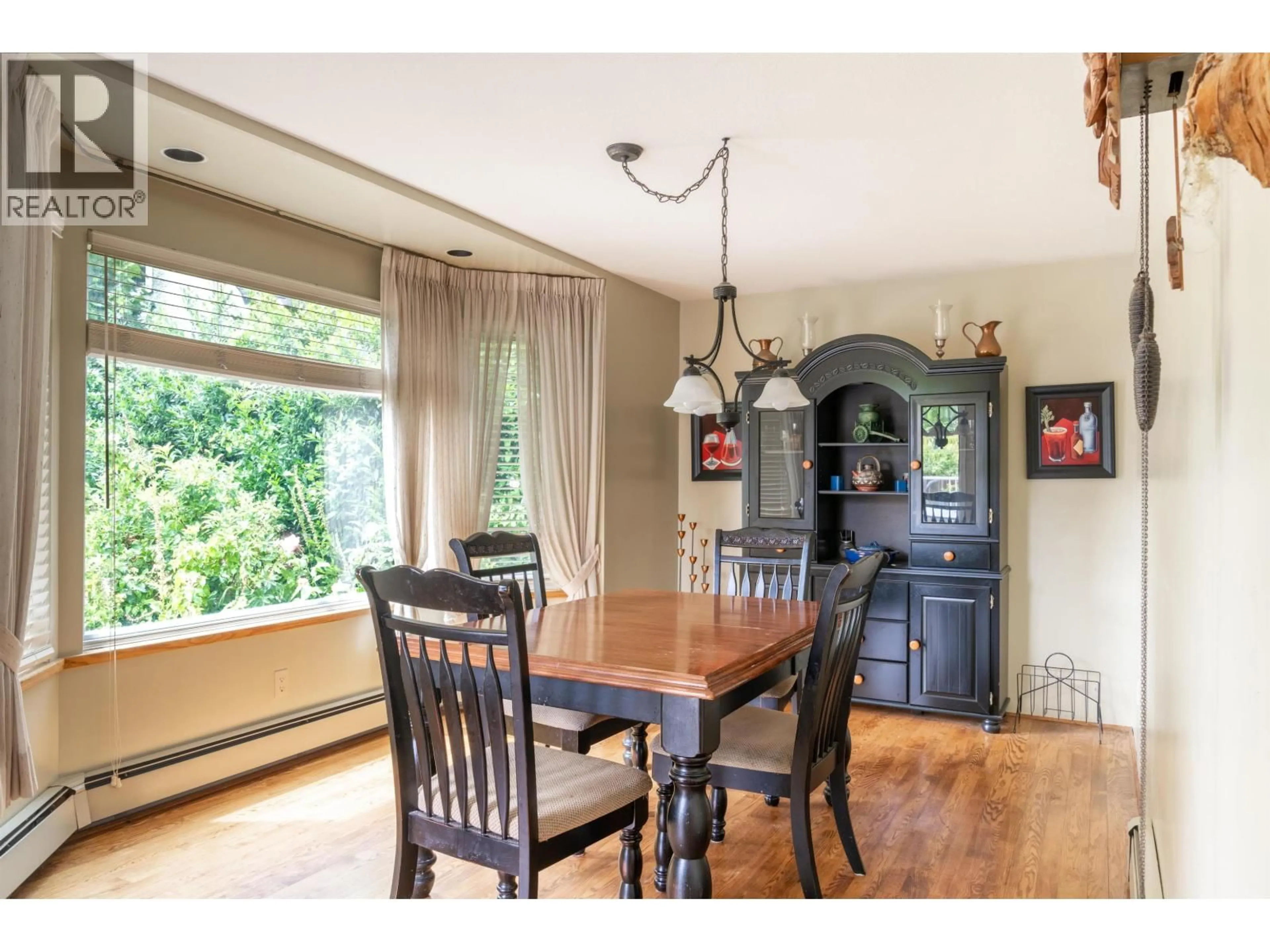 Dining room, wood/laminate floor for 1180 DEVONSHIRE CRESCENT, Vancouver British Columbia V6H2G1