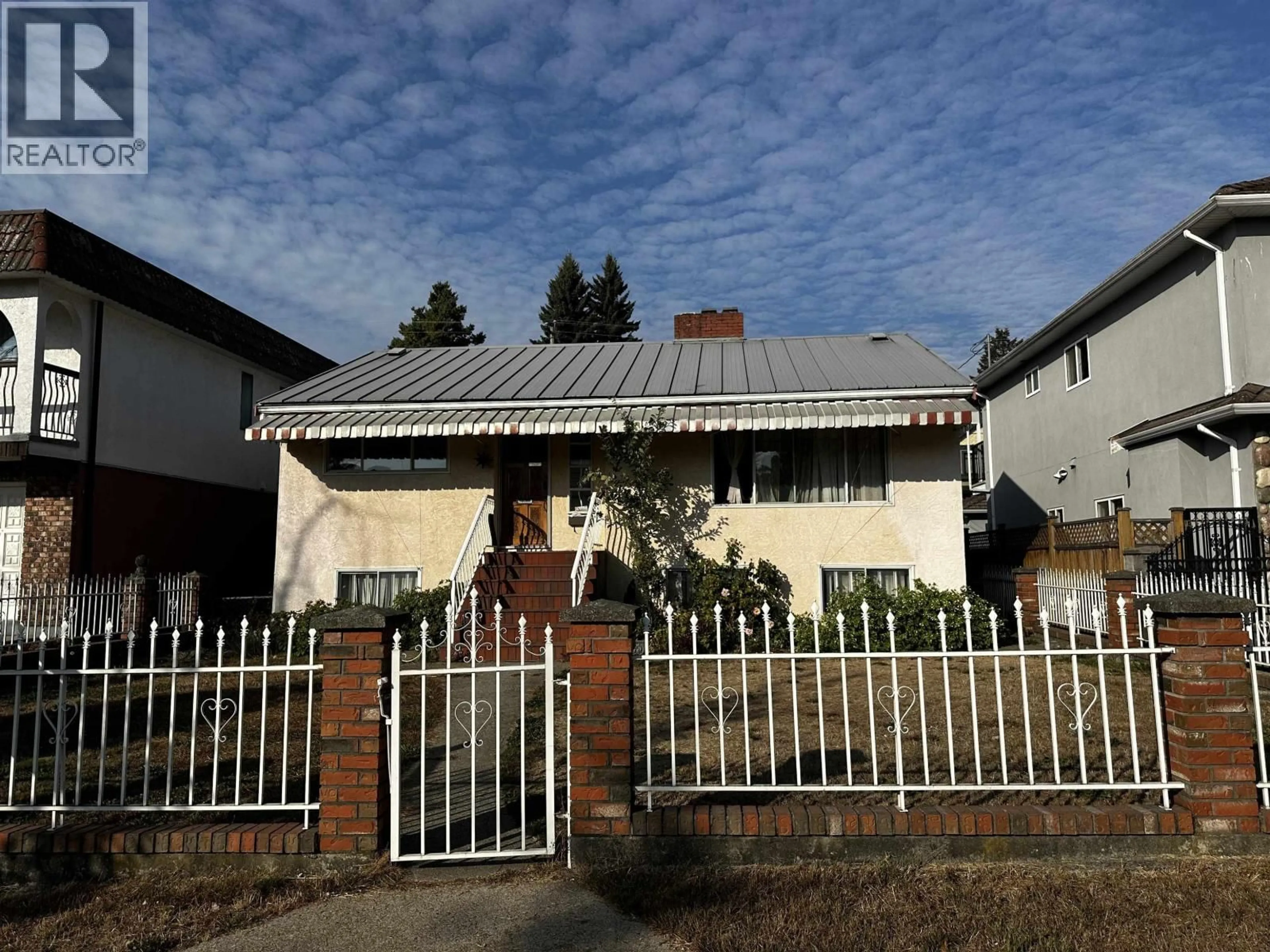Home with brick exterior material, street for 2621 8TH AVENUE, Vancouver British Columbia V5M1W4