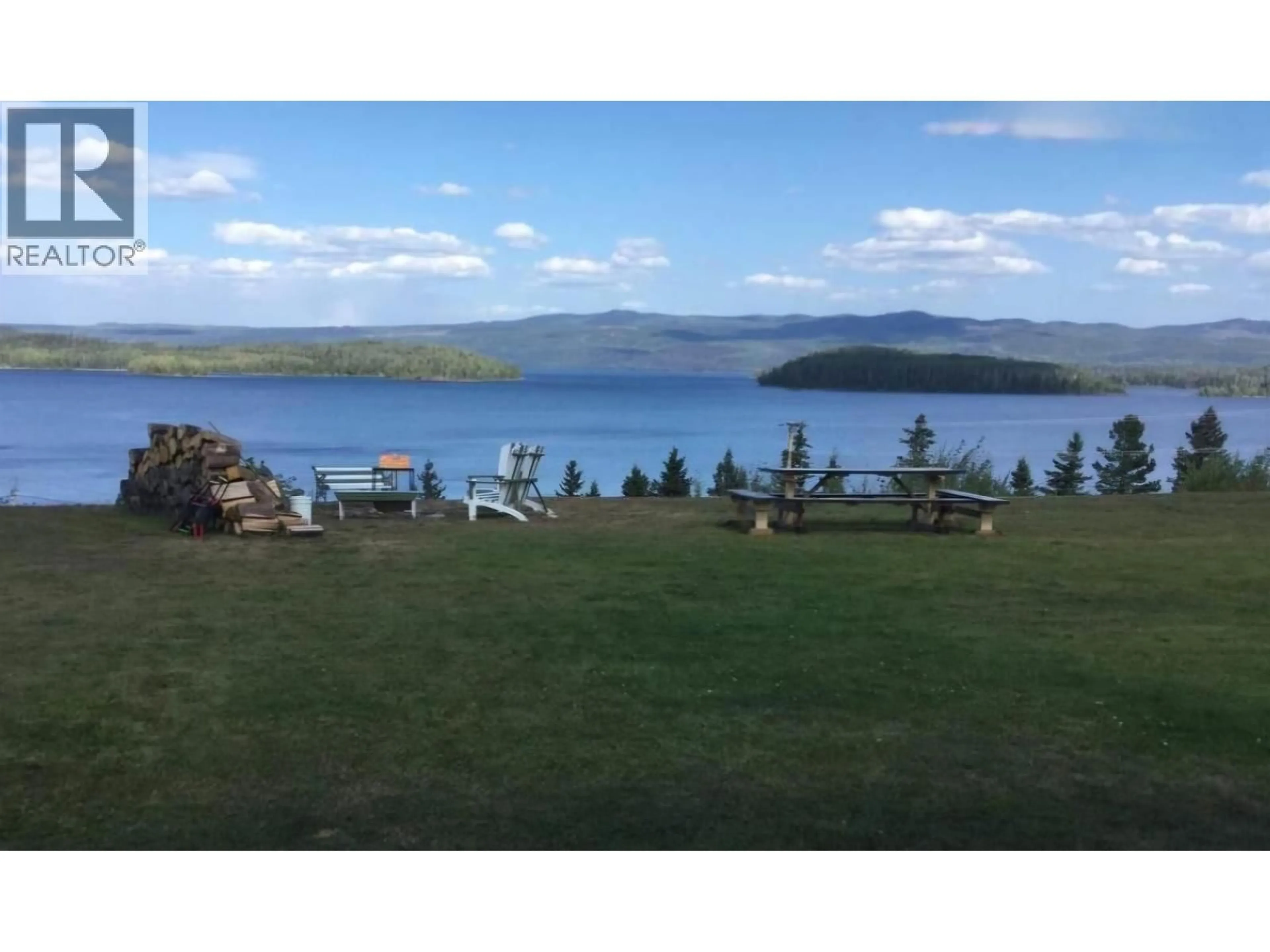 A pic from outside/outdoor area/front of a property/back of a property/a pic from drone, water/lake/river/ocean view for 27 - 50 HAGAN STREET, Granisle British Columbia V0J1W0