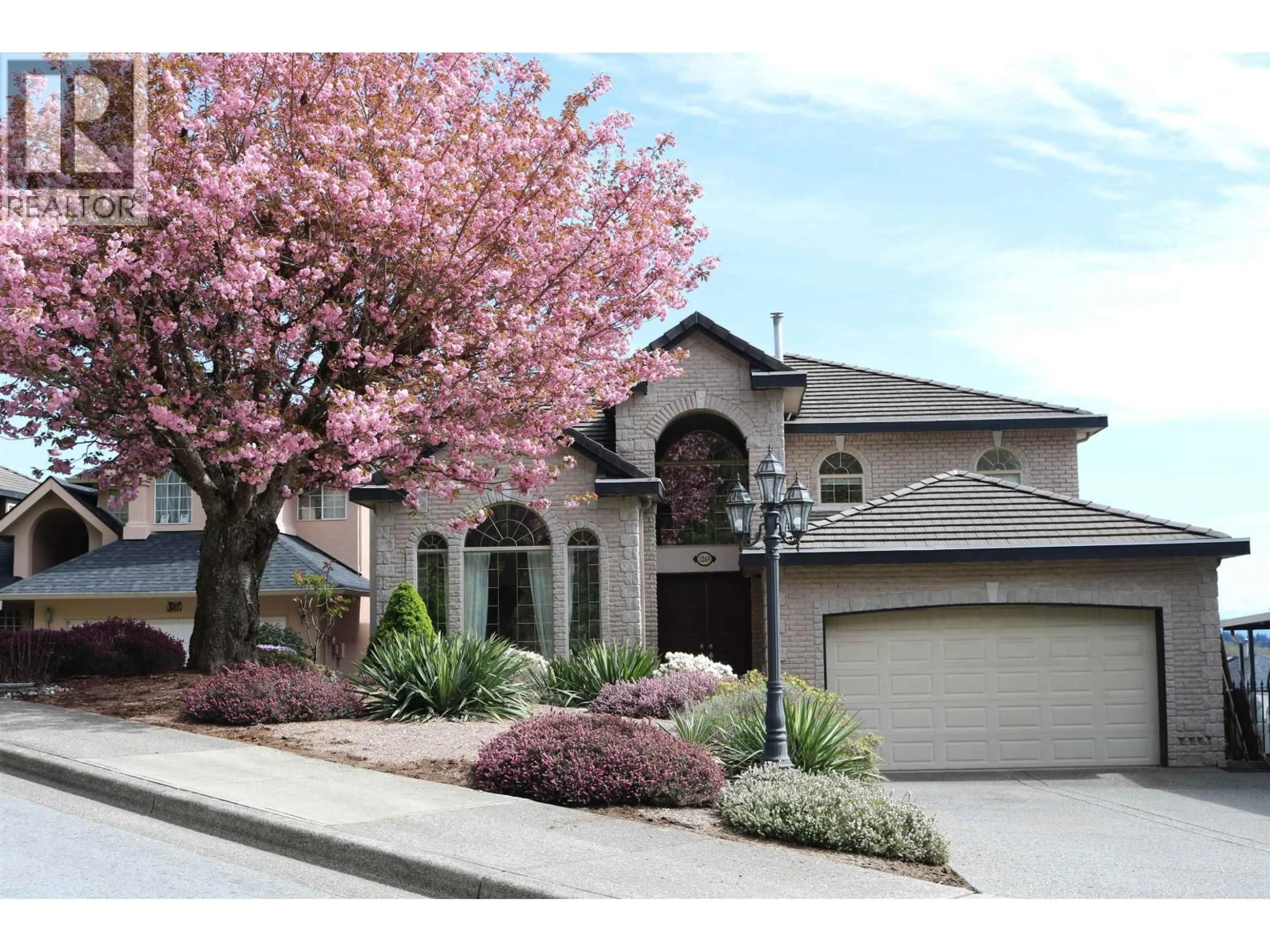 Home with vinyl exterior material, street for 1269 ERSKINE STREET, Coquitlam British Columbia V3B6Y1