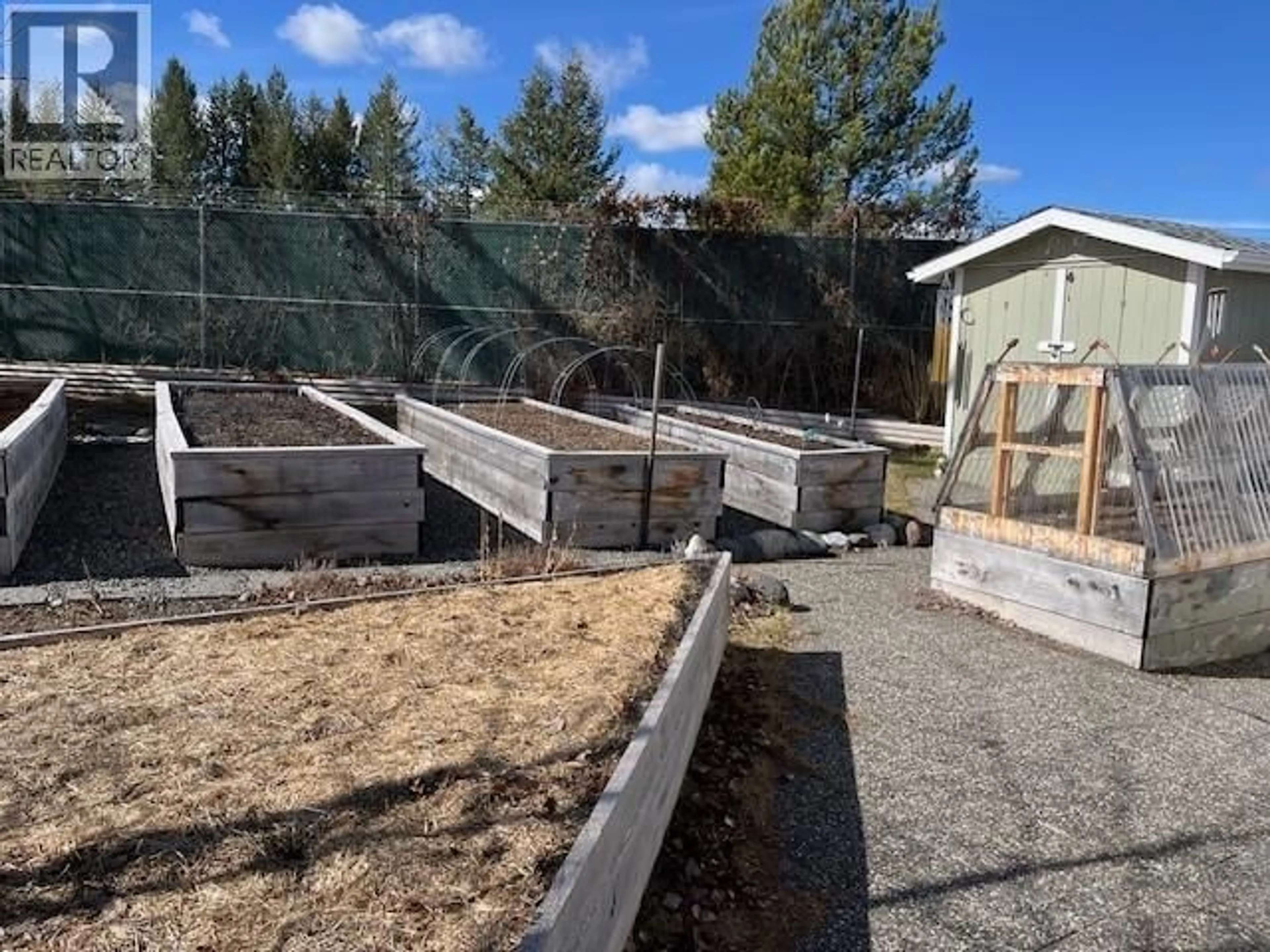 A pic from outside/outdoor area/front of a property/back of a property/a pic from drone, street for 9 - 375 HORSE LAKE ROAD, 100 Mile House British Columbia V0K2E0