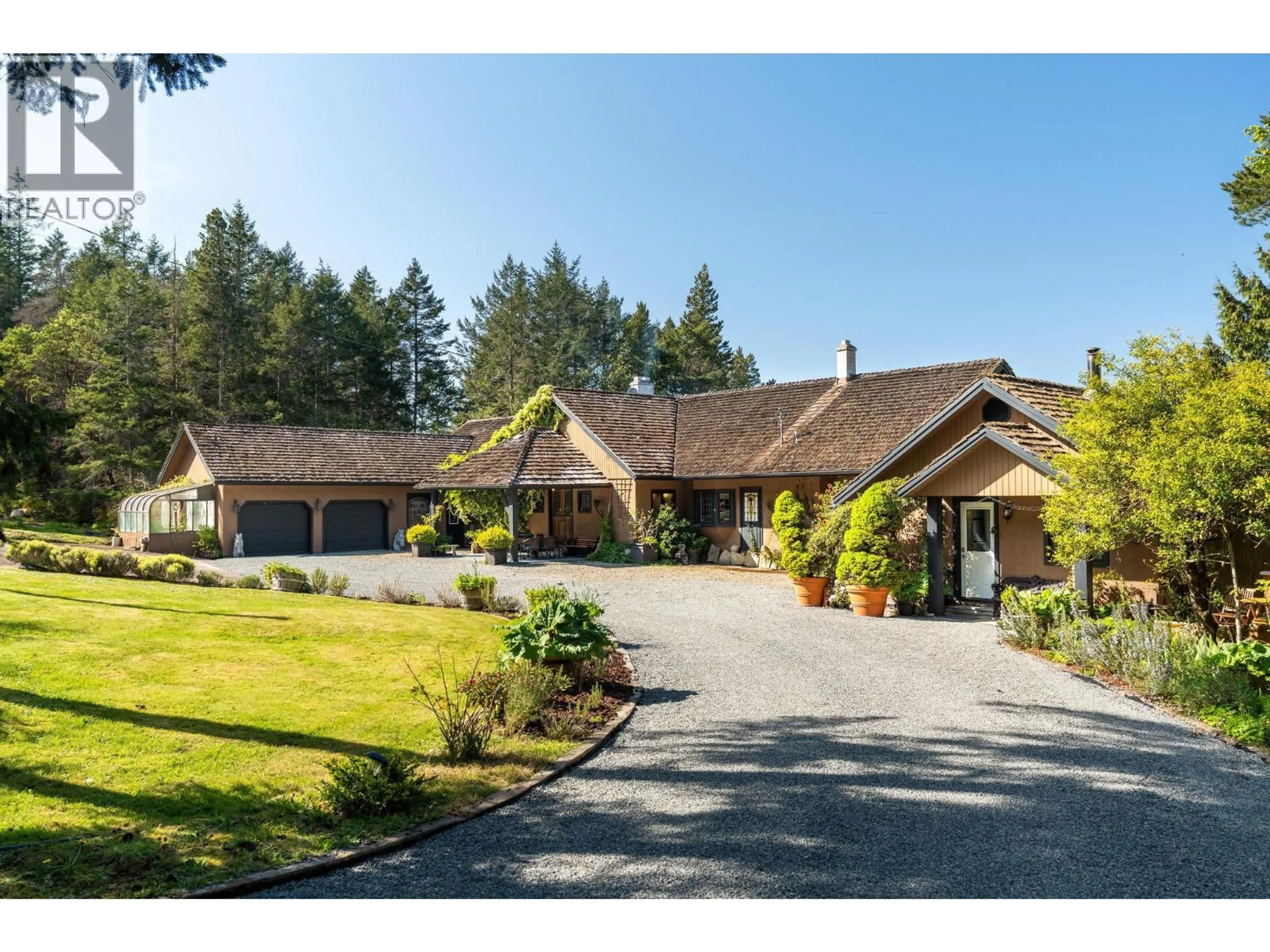 A pic from outside/outdoor area/front of a property/back of a property/a pic from drone, street for 474 STICKS ALLISON ROAD, Galiano Island British Columbia V0N1P0