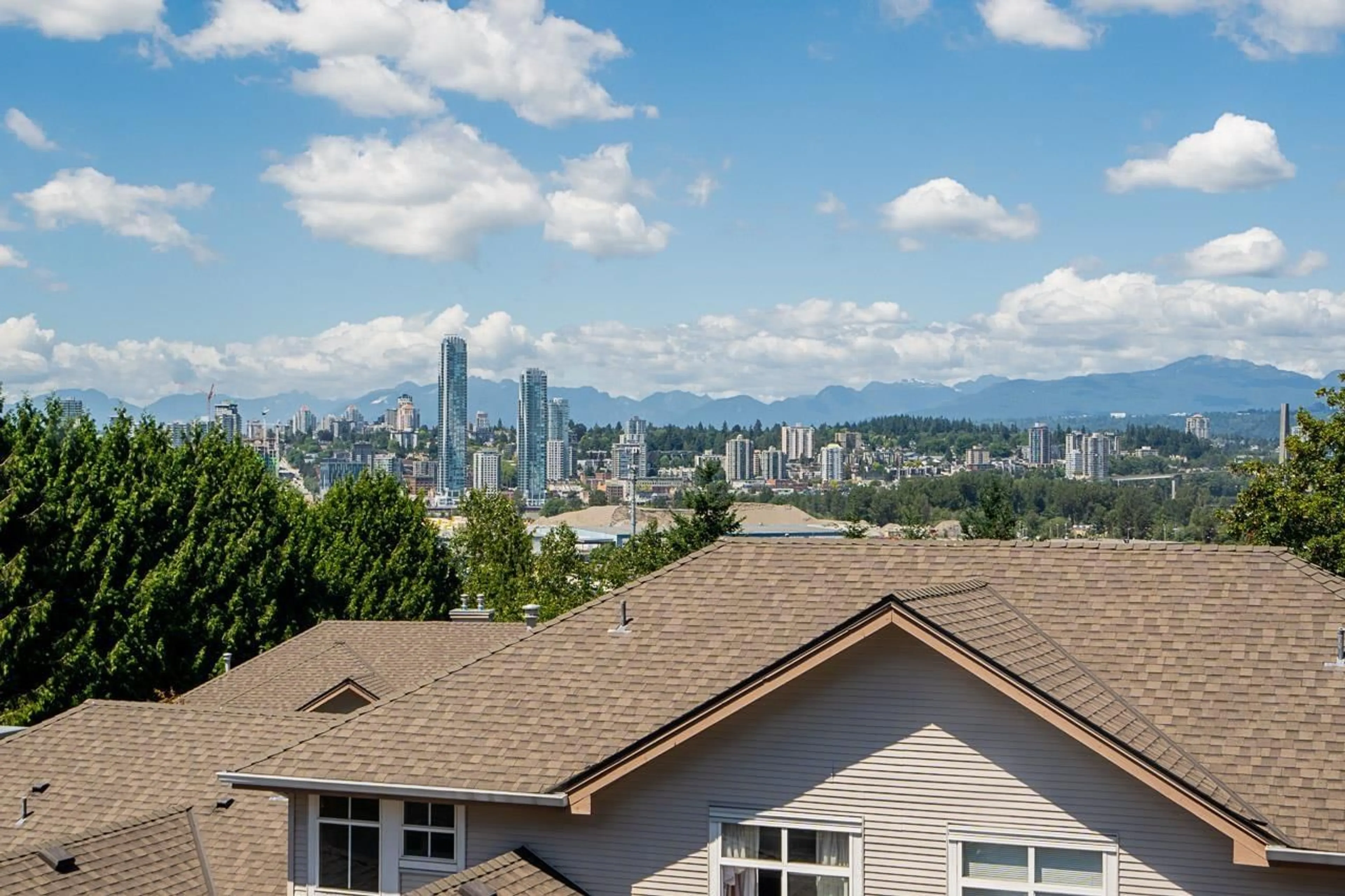 Home with vinyl exterior material, city buildings view from balcony for 44 - 11860 RIVER ROAD, Surrey British Columbia V3V2V7