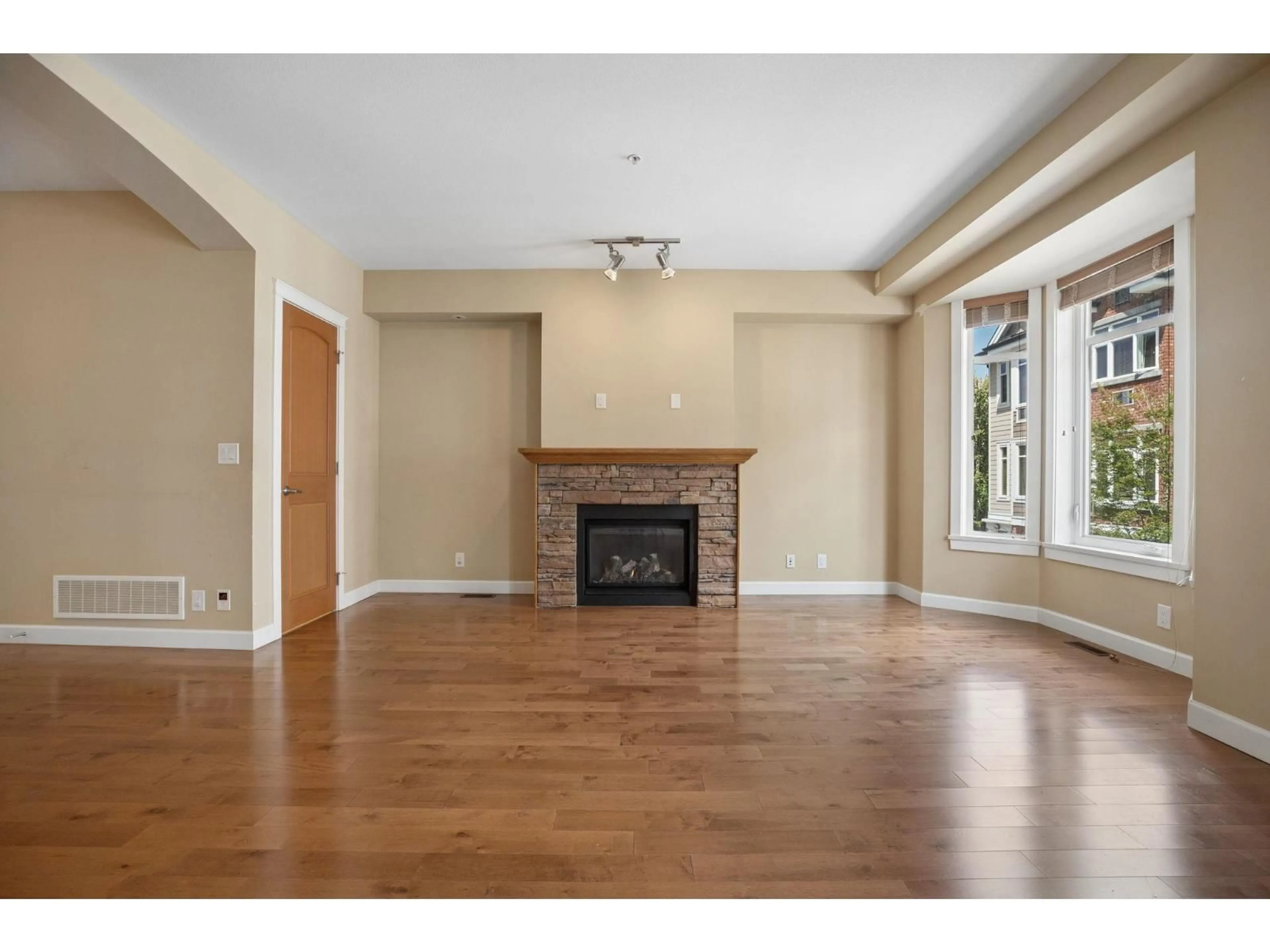 Living room with furniture, wood/laminate floor for 132 - 20738 84 AVENUE, Langley British Columbia V2Y0J6
