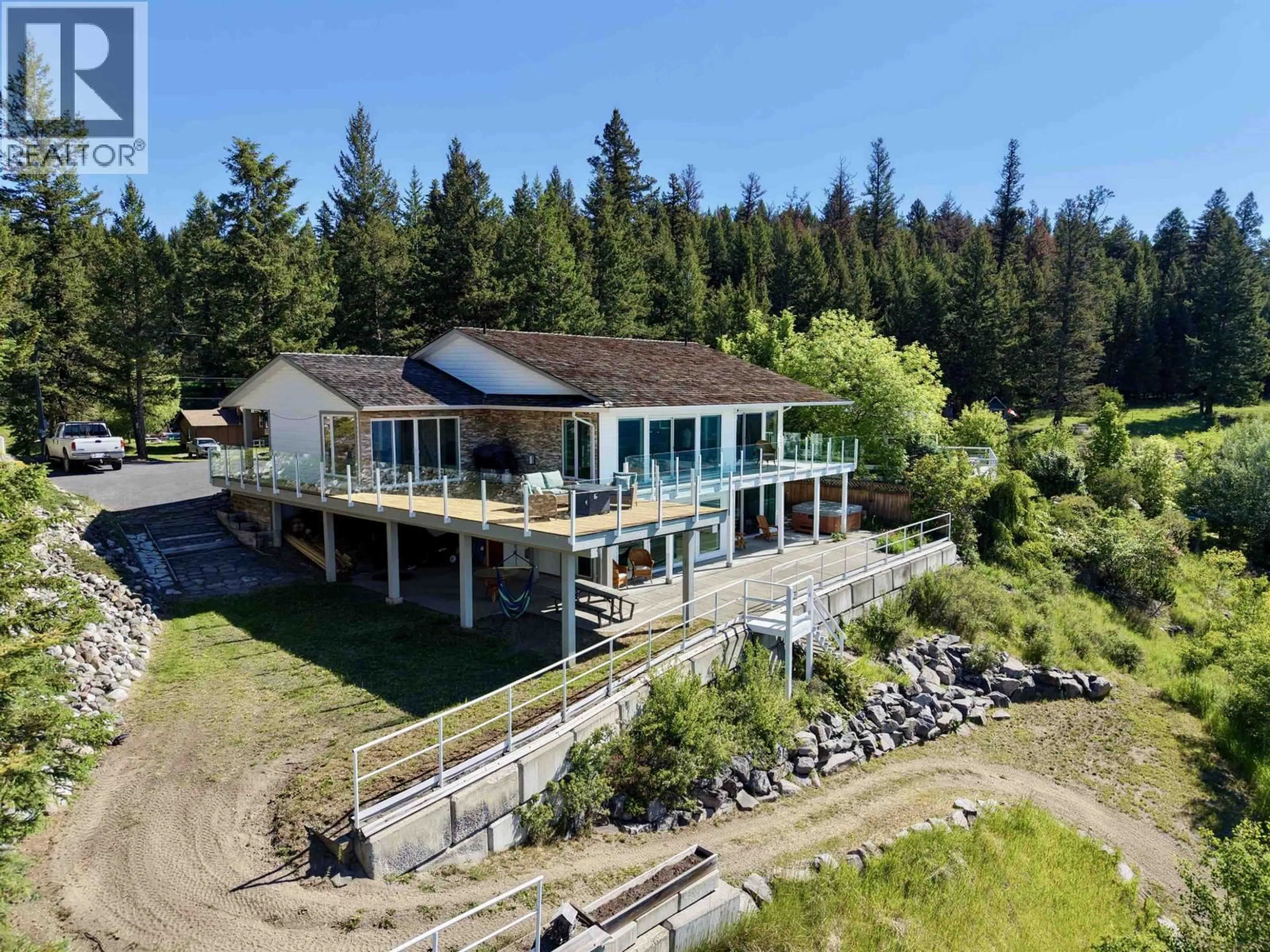 A pic from outside/outdoor area/front of a property/back of a property/a pic from drone, unknown for 6168 LAKESHORE DRIVE, Horse Lake British Columbia V0K2E3