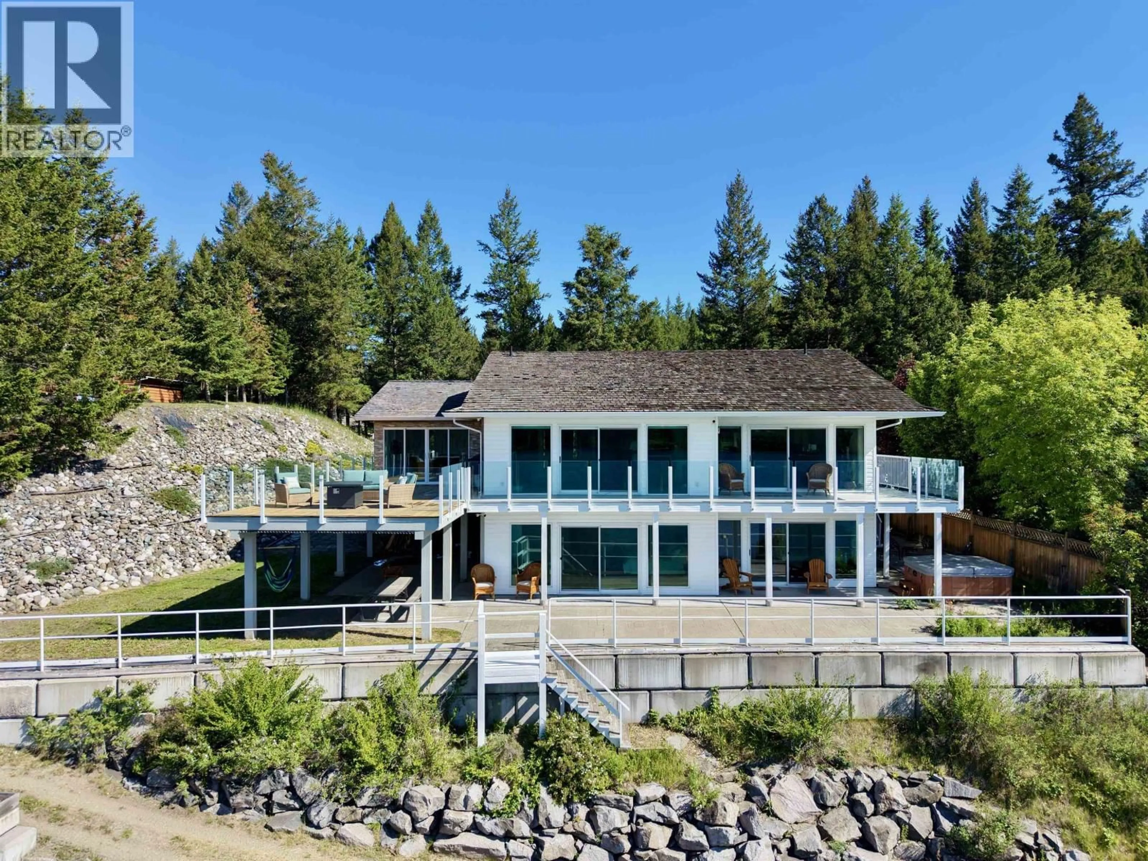 A pic from outside/outdoor area/front of a property/back of a property/a pic from drone, water/lake/river/ocean view for 6168 LAKESHORE DRIVE, Horse Lake British Columbia V0K2E3
