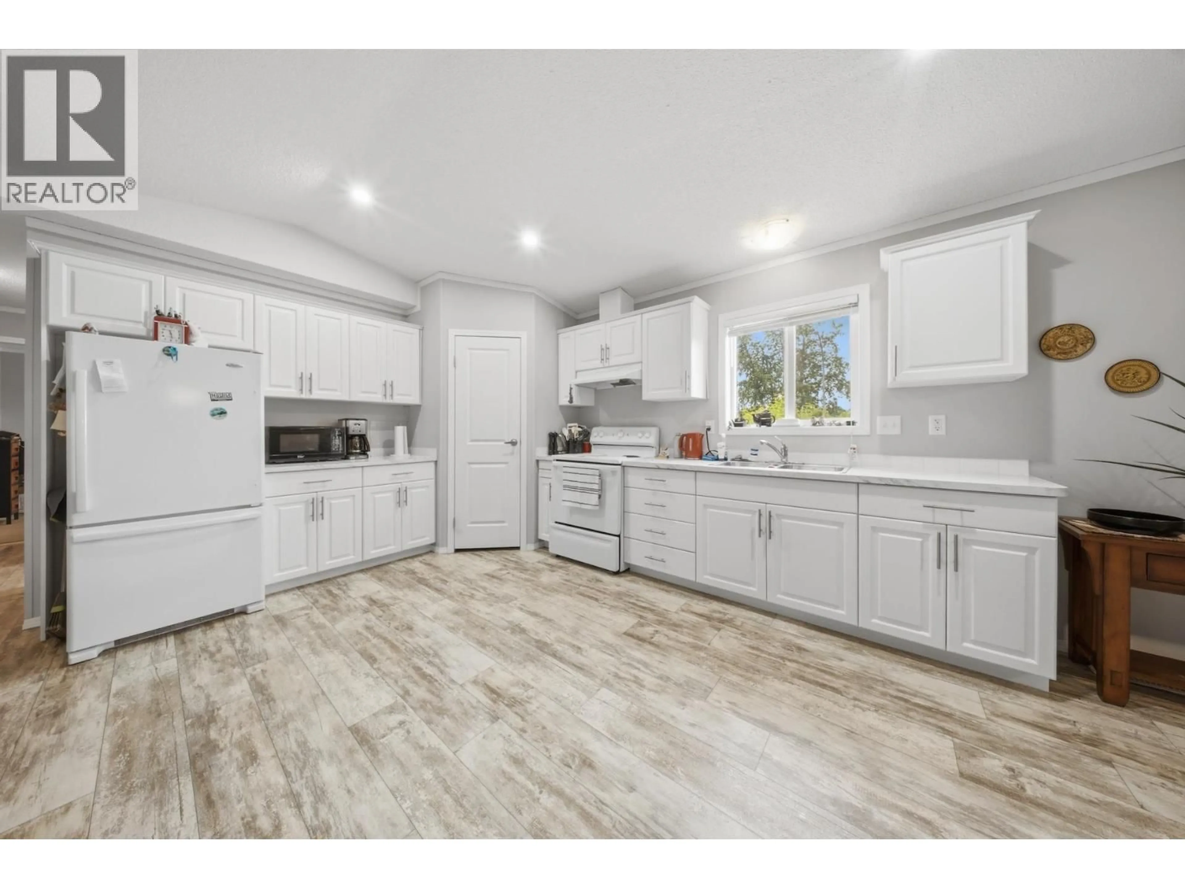 Open concept kitchen, unknown for 8903 76 STREET, Fort St. John British Columbia V1J2Z8