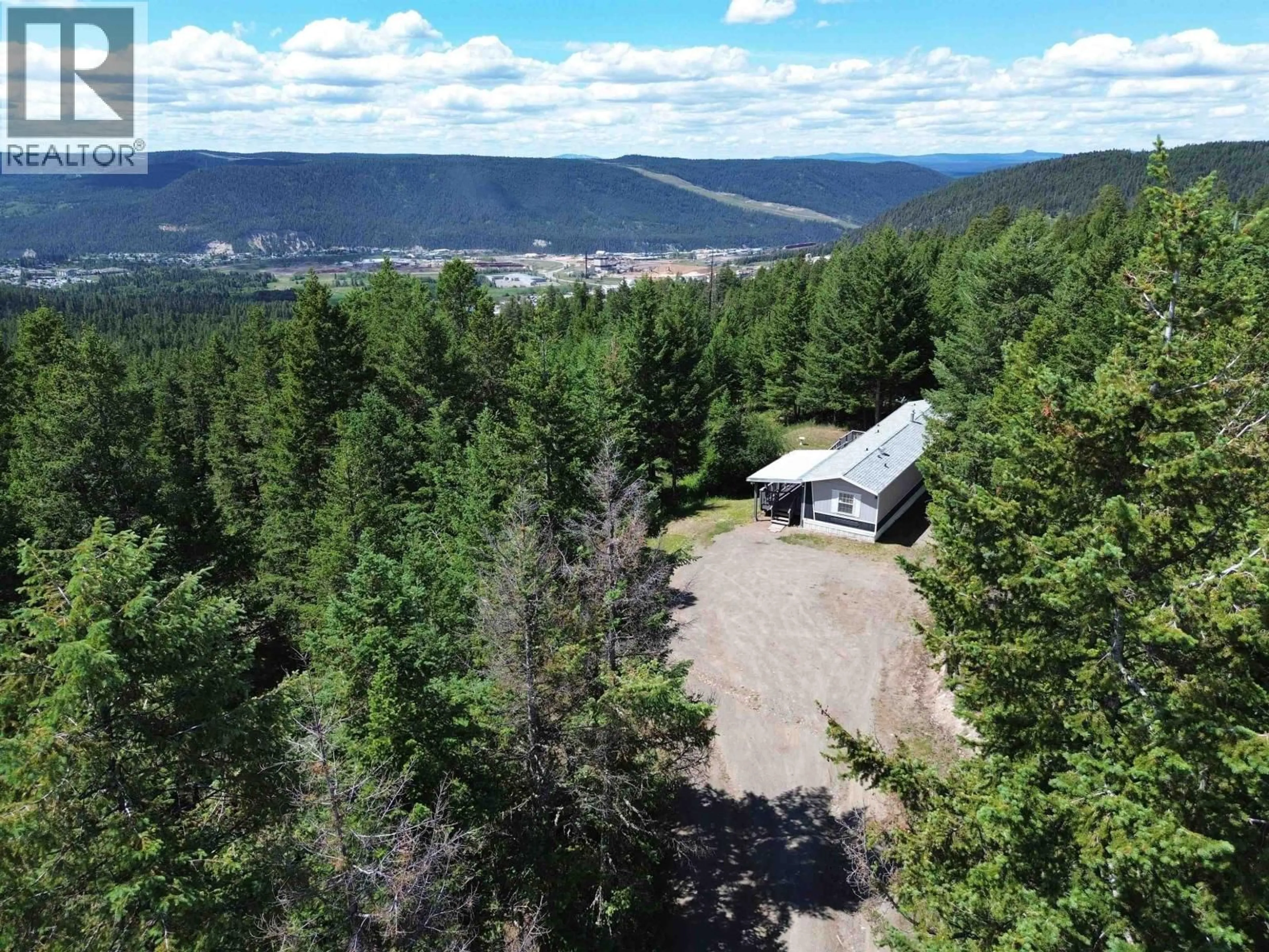 A pic from outside/outdoor area/front of a property/back of a property/a pic from drone, mountain view for 2055 SEIBERT PLACE, Williams Lake British Columbia V2G5C7