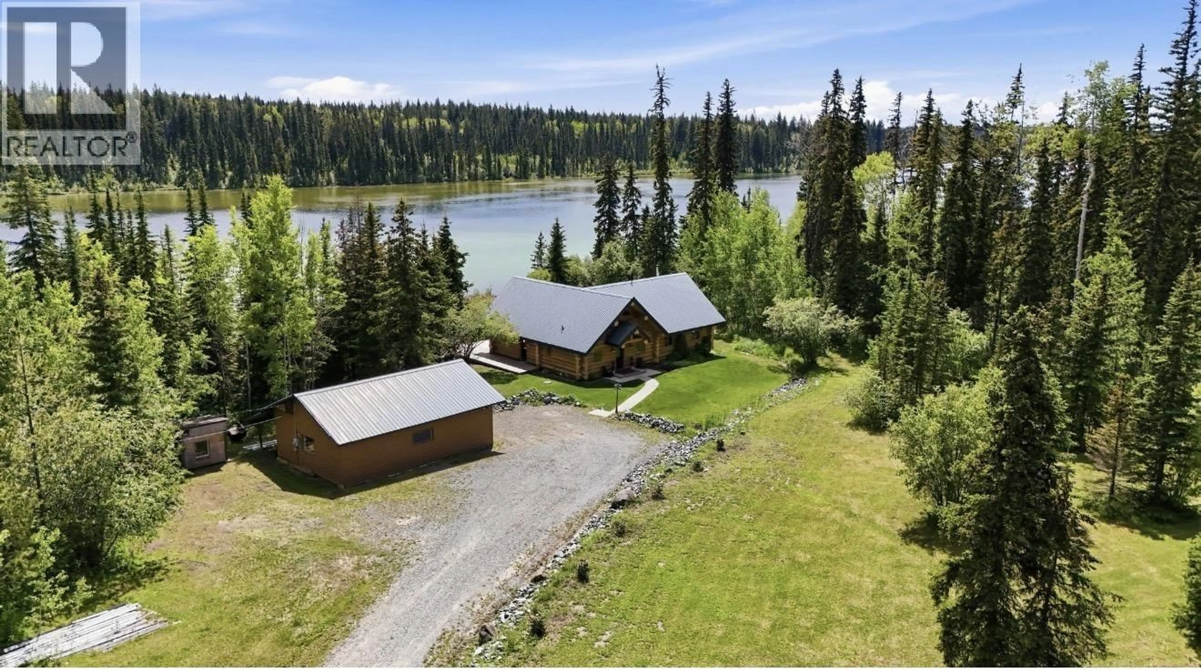 A pic from outside/outdoor area/front of a property/back of a property/a pic from drone, water/lake/river/ocean view for 3350 LIKELY ROAD, 150 Mile House British Columbia V0K2G0