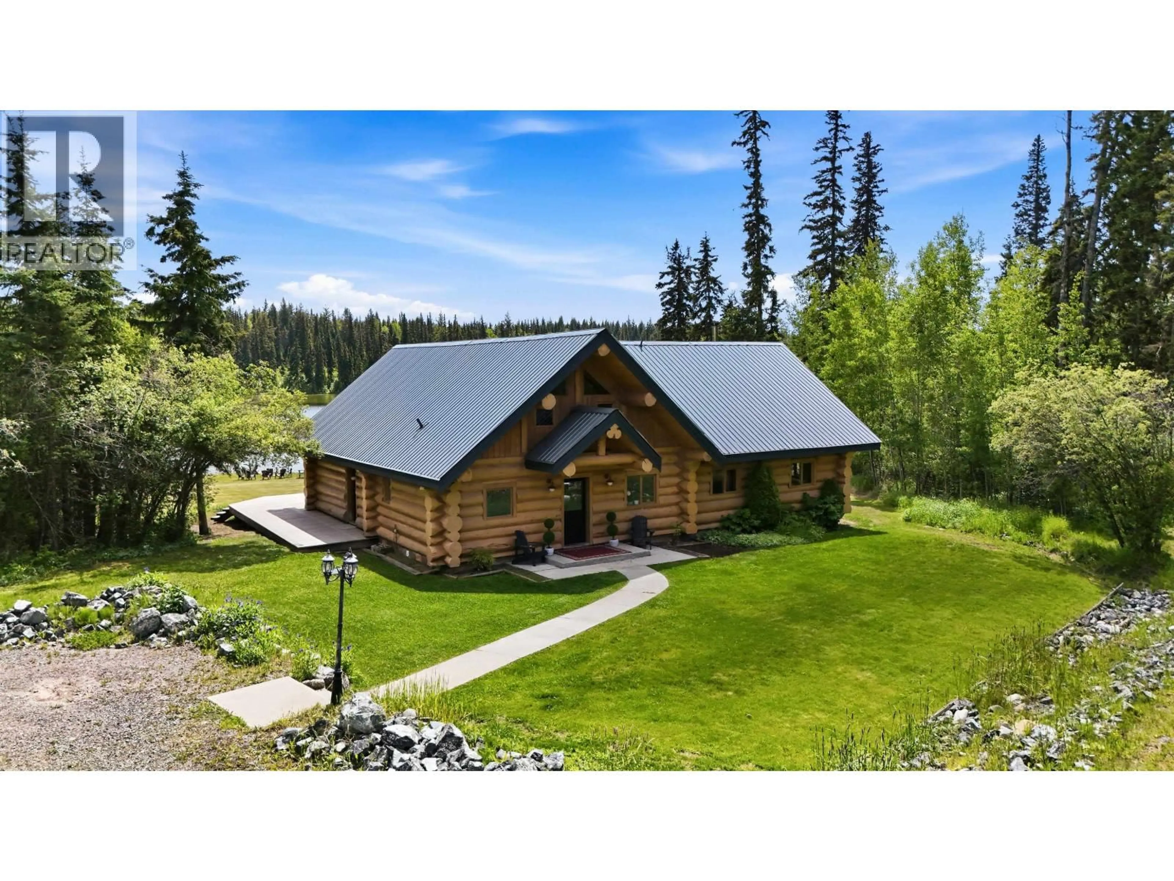 A pic from outside/outdoor area/front of a property/back of a property/a pic from drone, unknown for 3350 LIKELY ROAD, 150 Mile House British Columbia V0K2G0