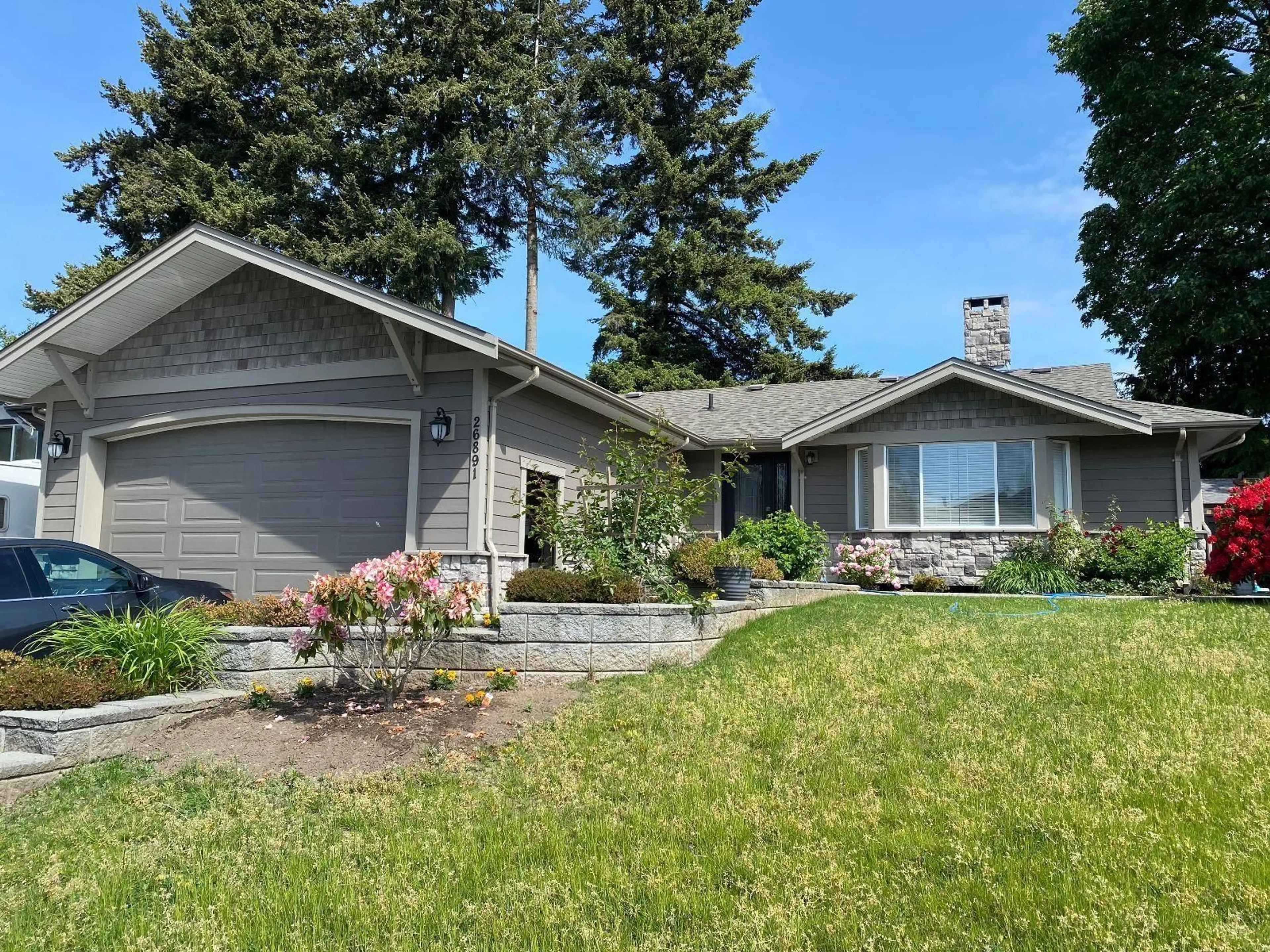 Home with vinyl exterior material, street for 26891 32A AVENUE, Langley British Columbia V4W3G4