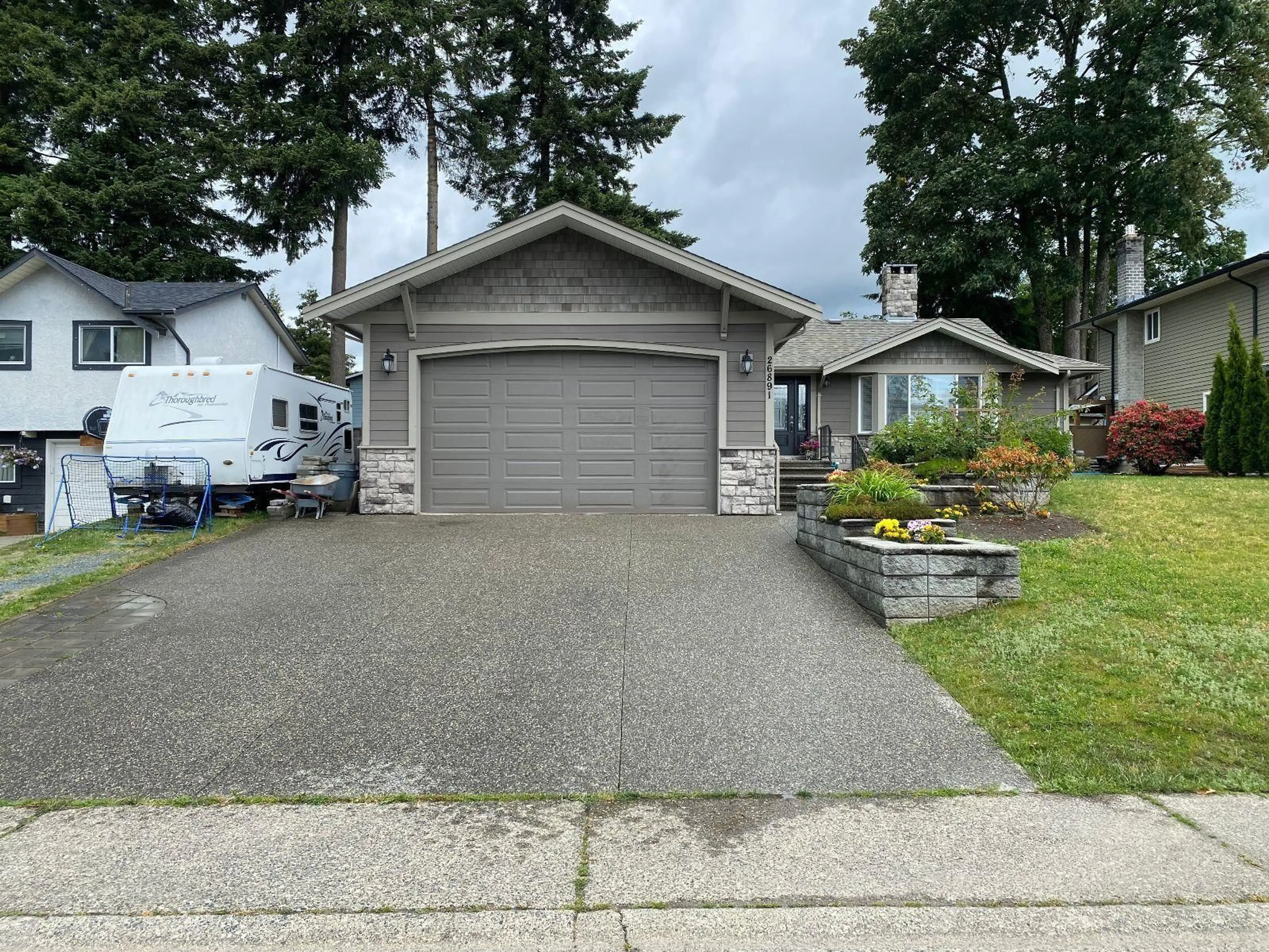 Home with vinyl exterior material, street for 26891 32A AVENUE, Langley British Columbia V4W3G4
