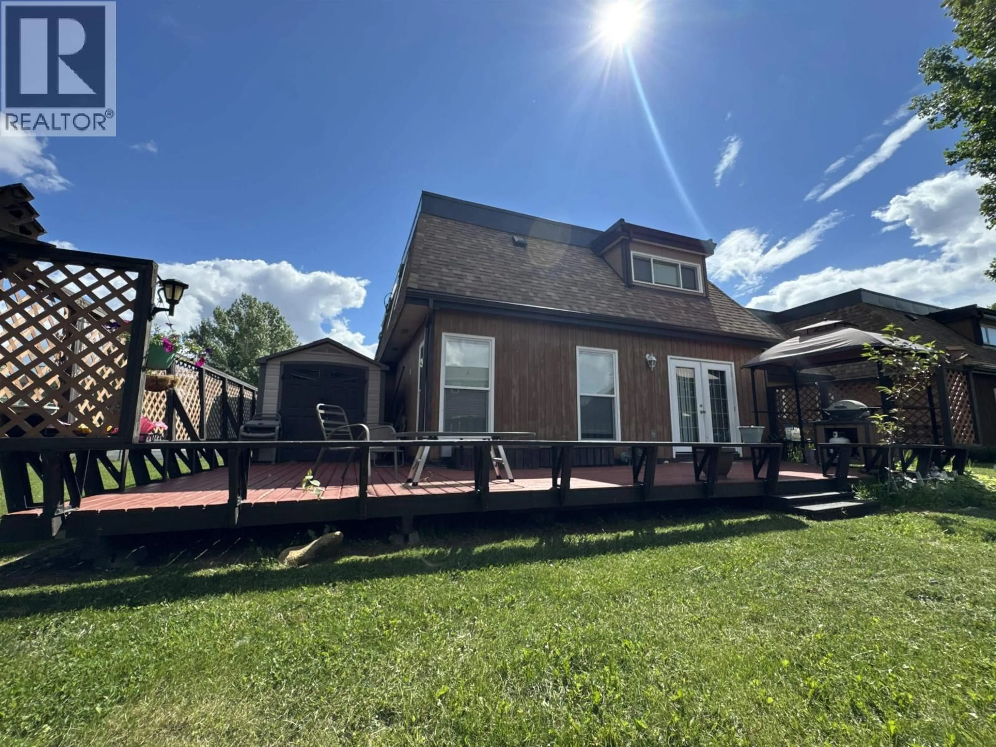 A pic from outside/outdoor area/front of a property/back of a property/a pic from drone, unknown for 10640 102 STREET, Fort St. John British Columbia V1J4X7