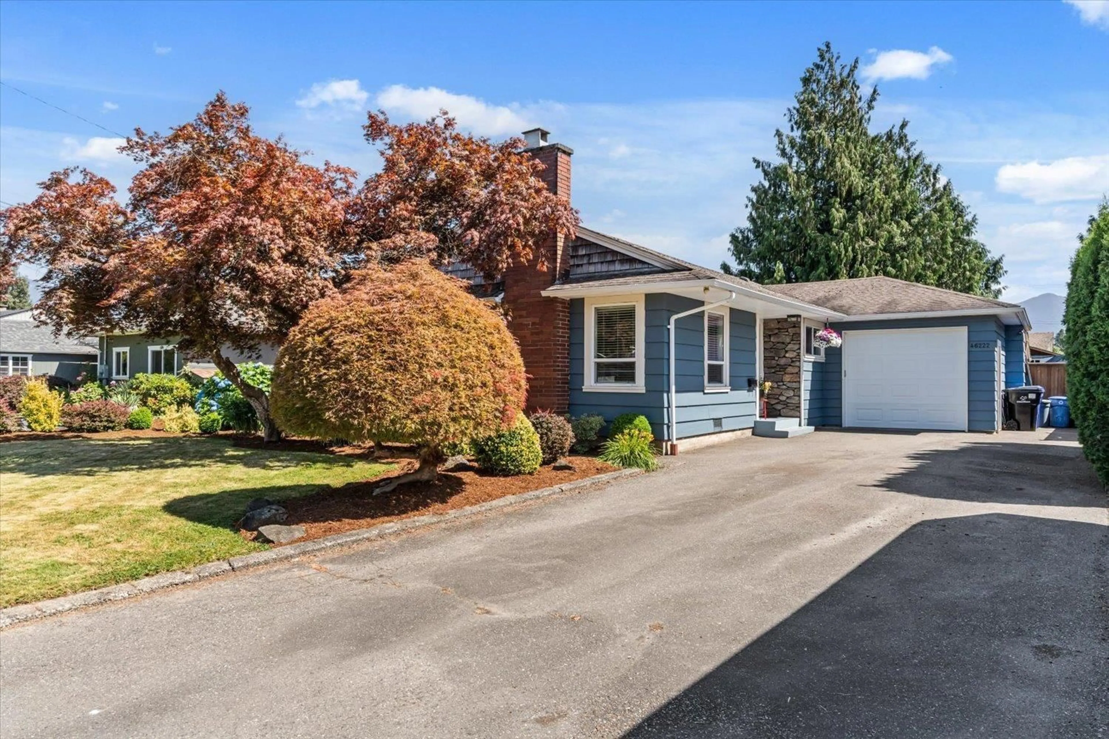 Home with vinyl exterior material, street for 46222 MCCAFFREY BOULEVARD, Chilliwack British Columbia V2P1E1