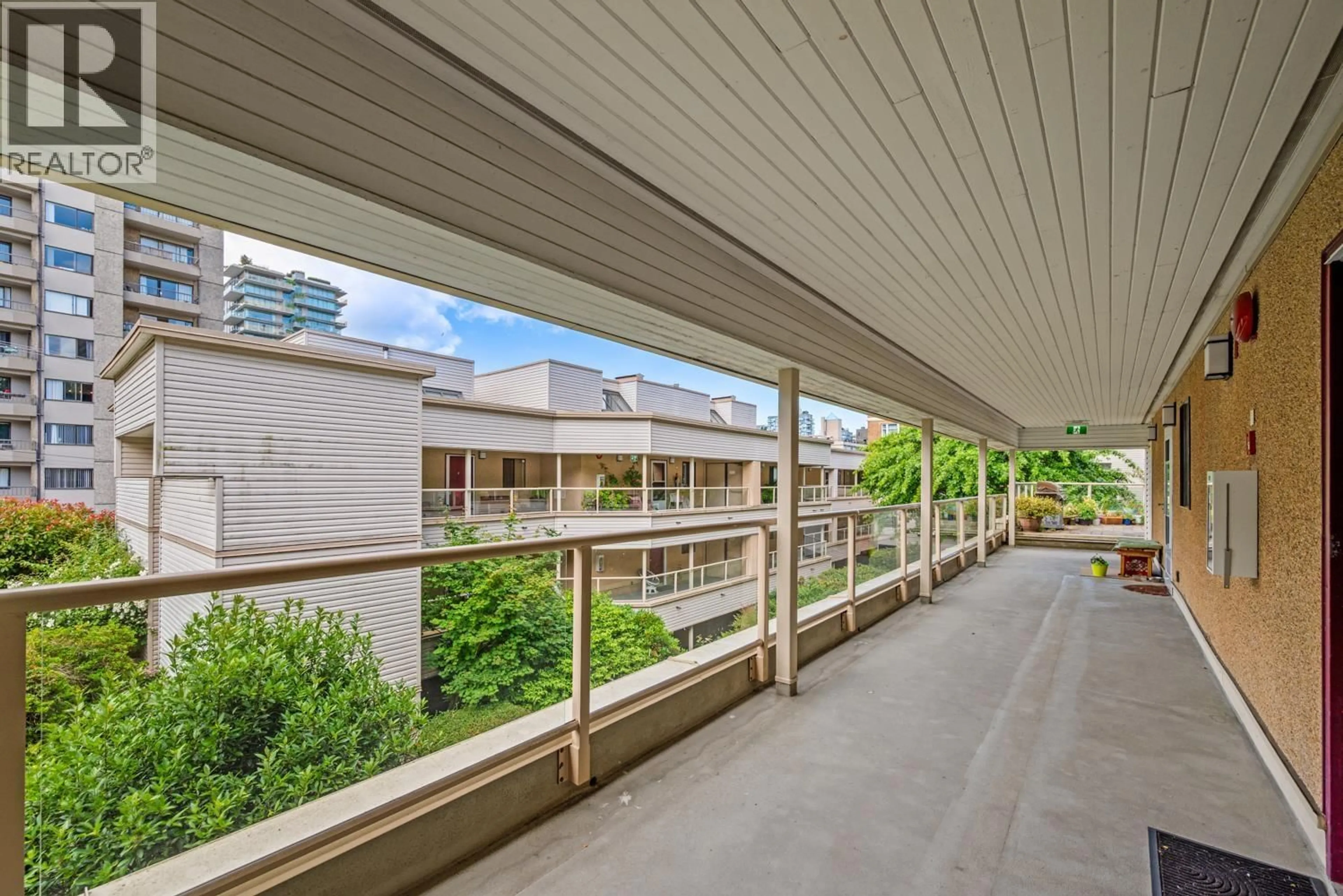 Patio, city buildings view from balcony for 402 - 1350 COMOX STREET, Vancouver British Columbia V6E4E1