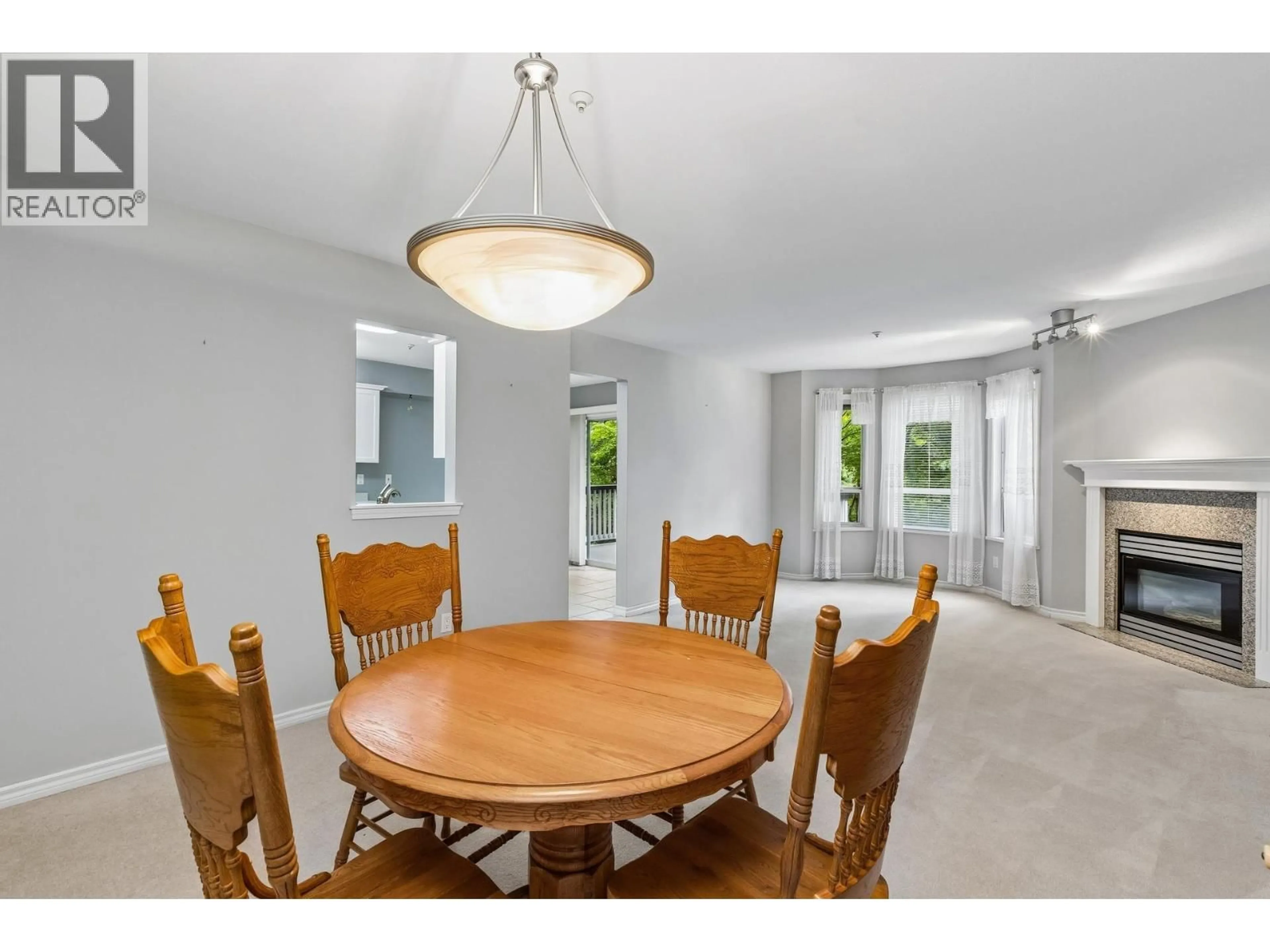 Dining room, ceramic/tile floor for 206 - 1150 LYNN VALLEY ROAD, North Vancouver British Columbia V7J1Z9