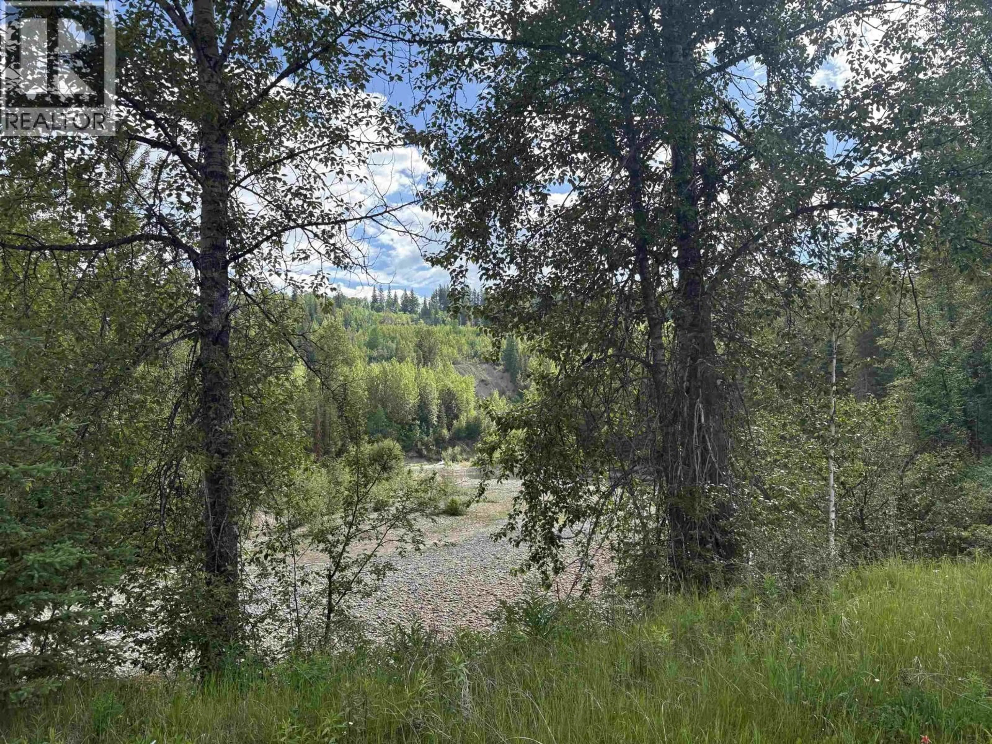 A pic from outside/outdoor area/front of a property/back of a property/a pic from drone, forest/trees view for 3 - 39142 CARIBOO HIGHWAY, Hixon British Columbia V0K1A0