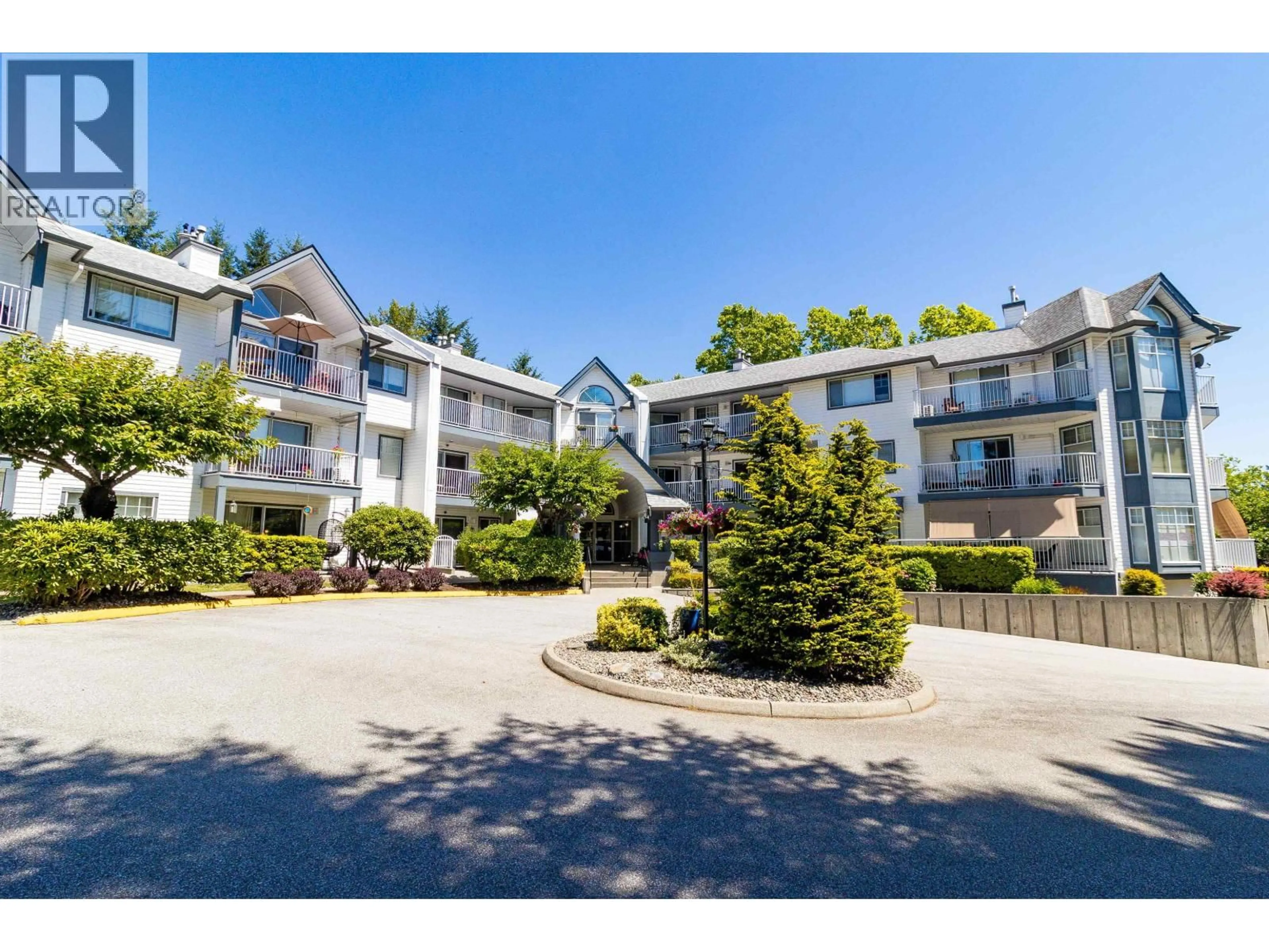 A pic from outside/outdoor area/front of a property/back of a property/a pic from drone, mountain view for 314 - 11601 227 STREET, Maple Ridge British Columbia V2X0J7