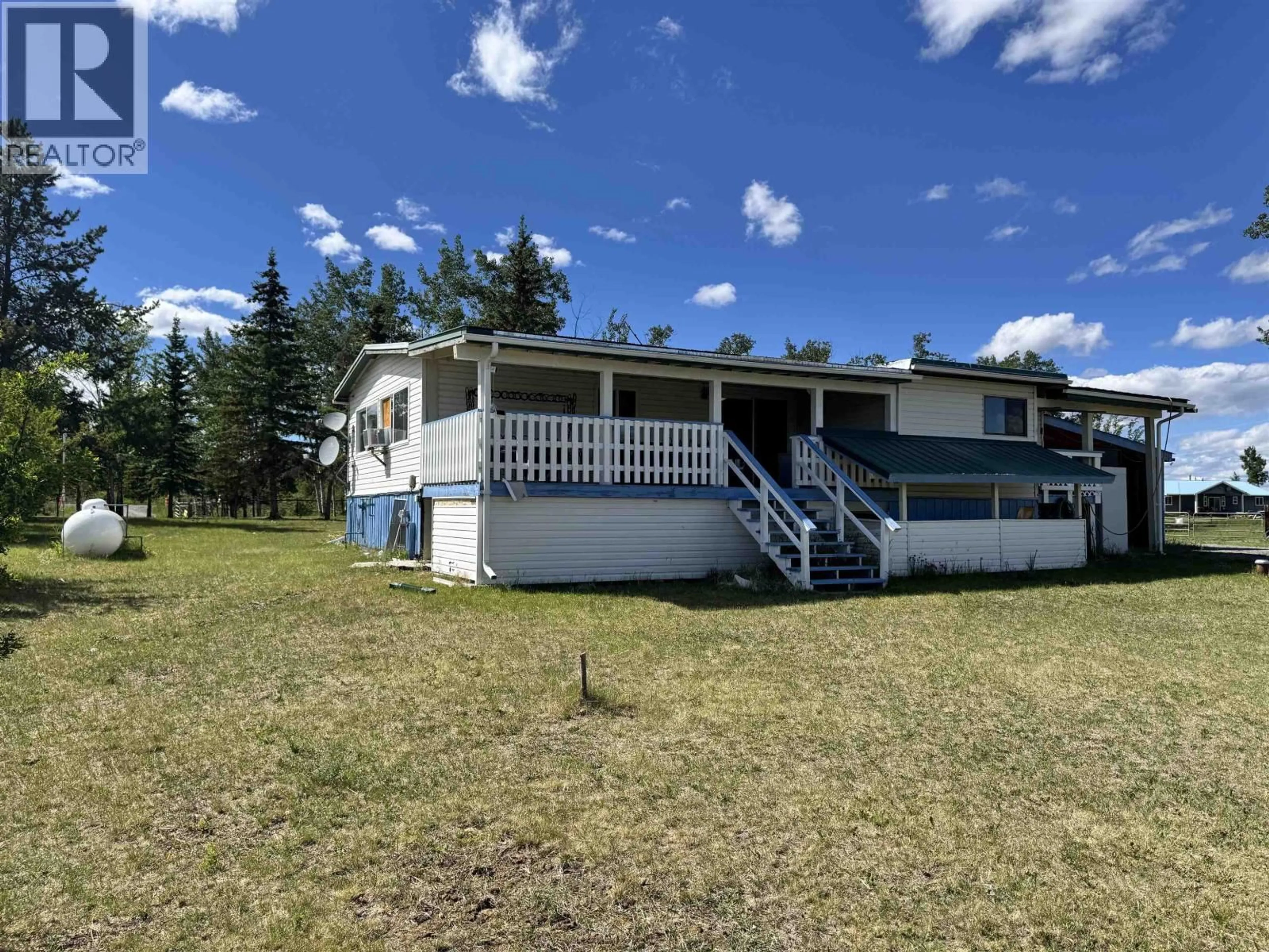 A pic from outside/outdoor area/front of a property/back of a property/a pic from drone, unknown for 1740 CARIBOO 97 HIGHWAY, 70 Mile House British Columbia V0K2K0