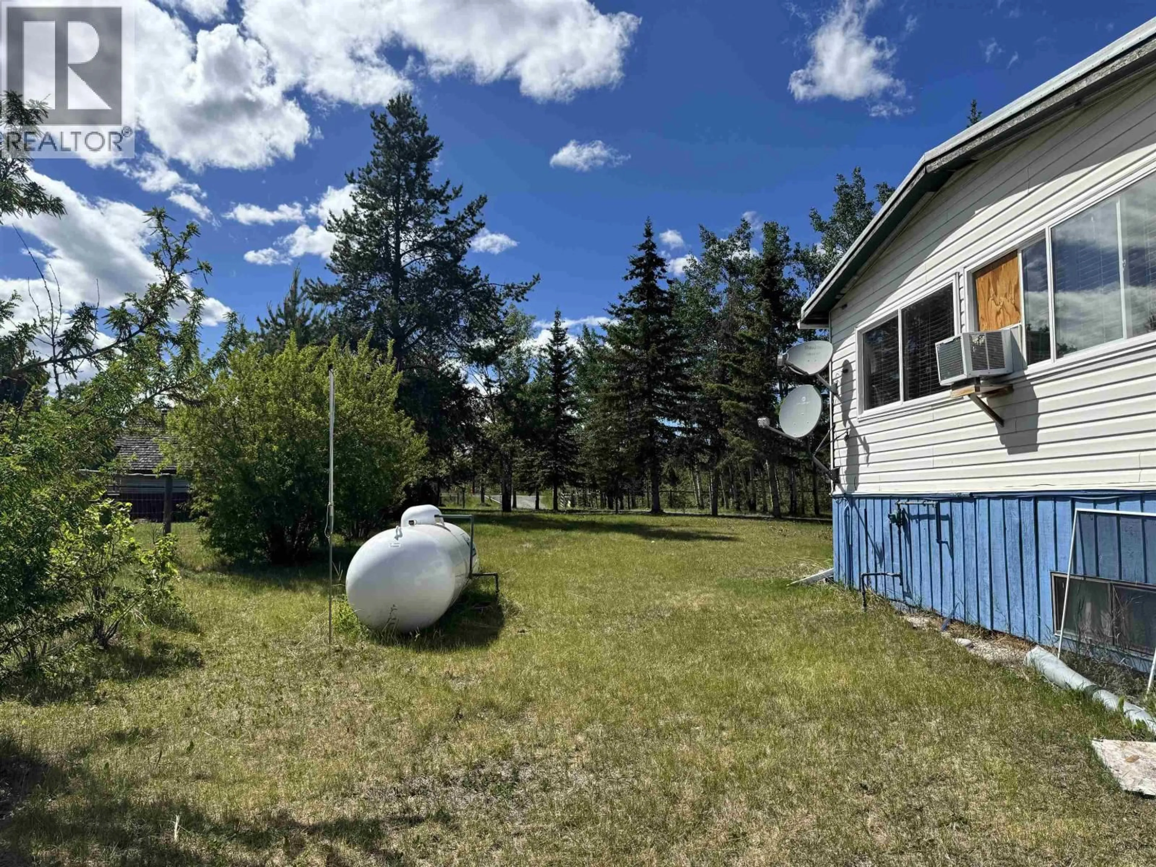 A pic from outside/outdoor area/front of a property/back of a property/a pic from drone, unknown for 1740 CARIBOO 97 HIGHWAY, 70 Mile House British Columbia V0K2K0