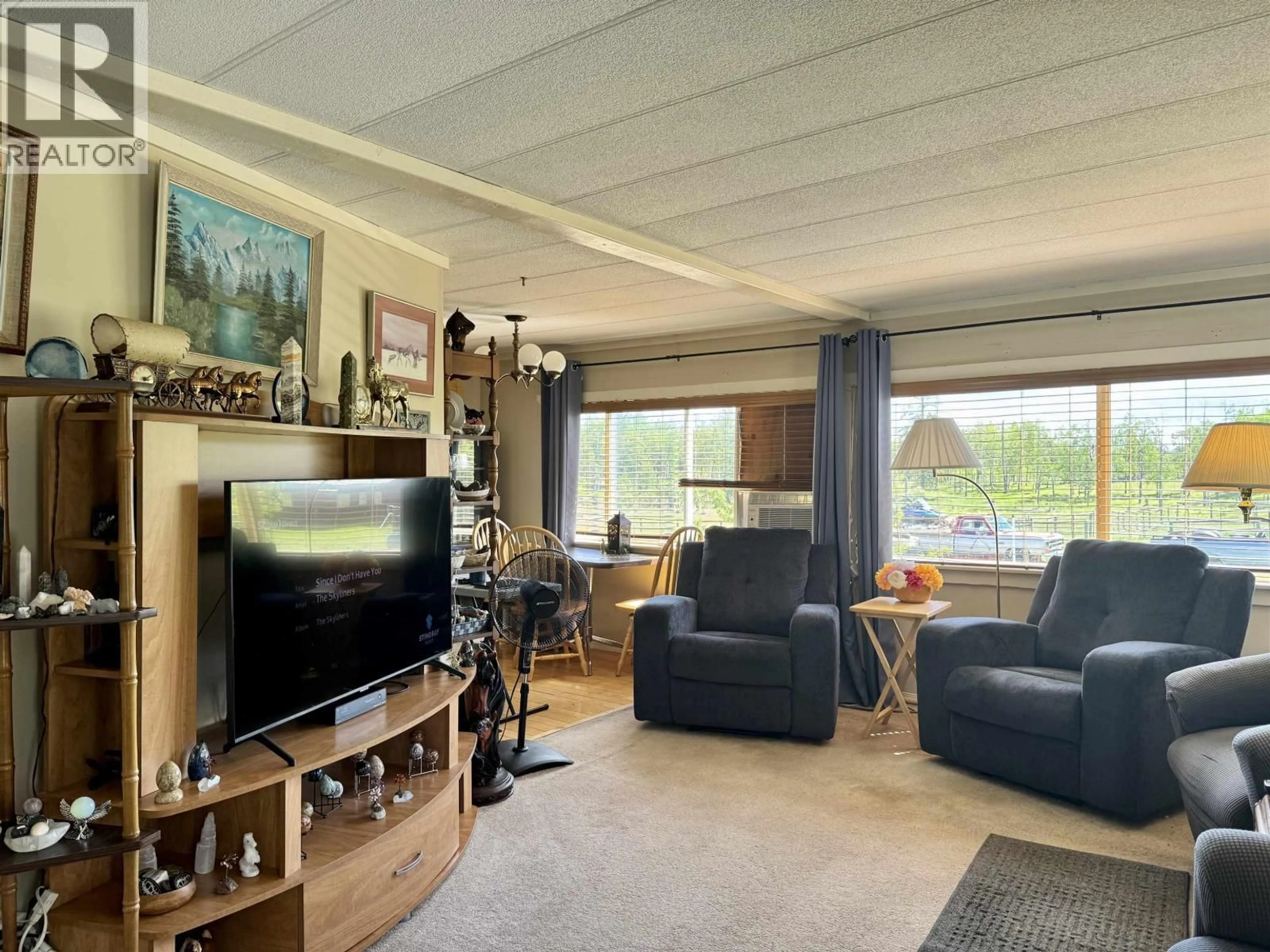 Living room with furniture, unknown for 1740 CARIBOO 97 HIGHWAY, 70 Mile House British Columbia V0K2K0