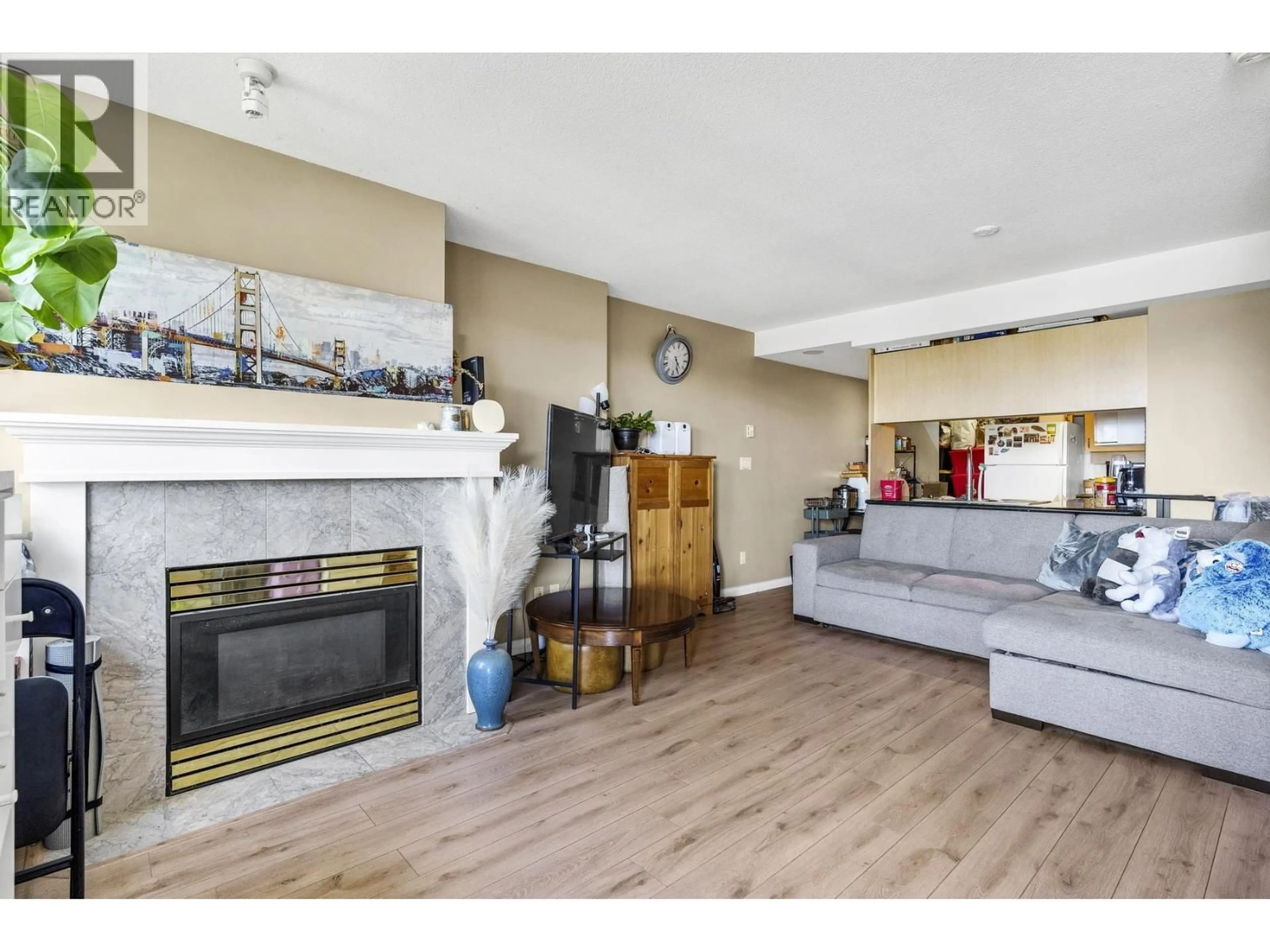 Living room with furniture, wood/laminate floor for 1303 - 6611 COONEY ROAD, Richmond British Columbia V6Y4C5