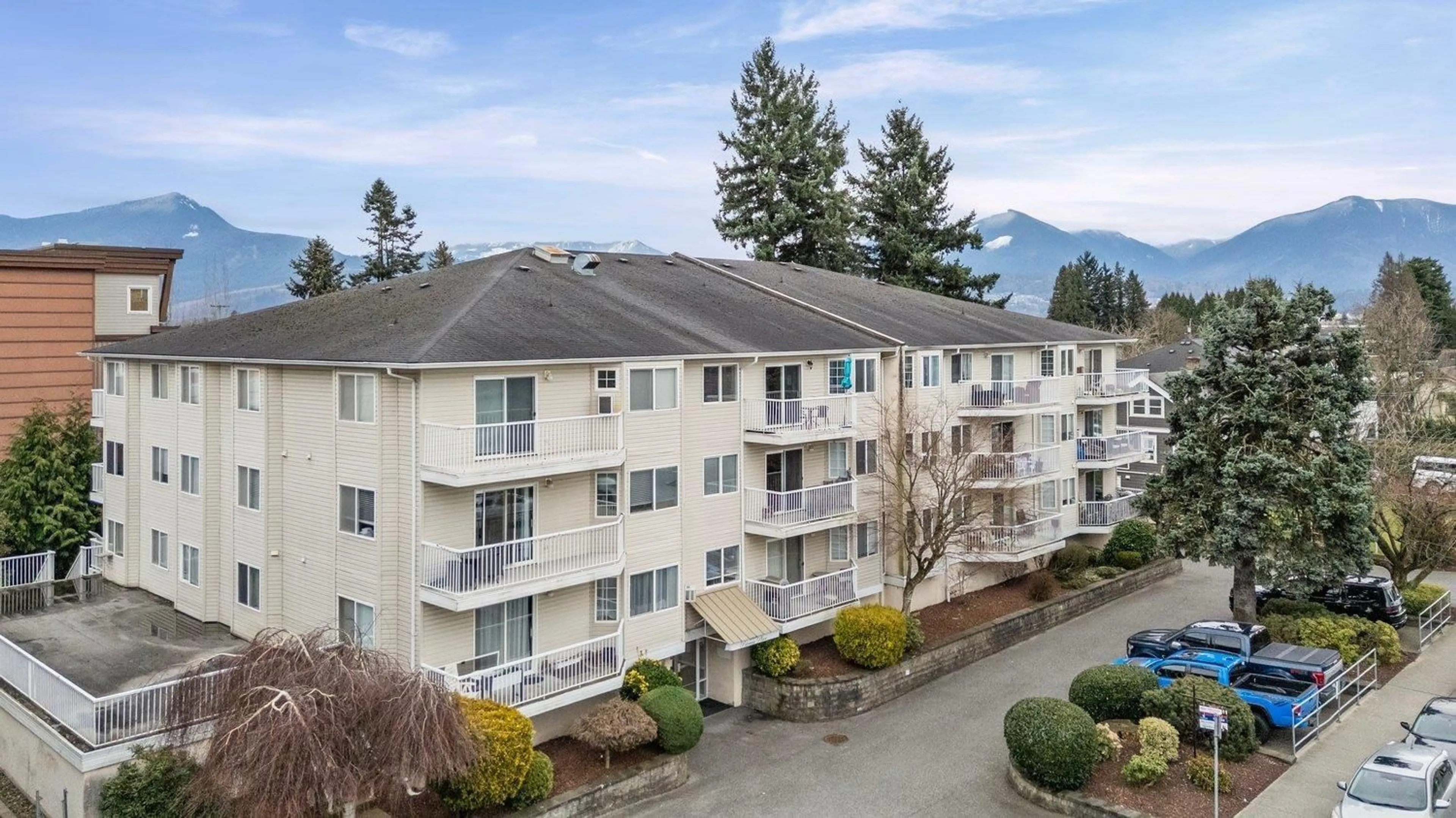 A pic from outside/outdoor area/front of a property/back of a property/a pic from drone, mountain view for 103 - 8934 MARY STREET, Chilliwack British Columbia V2P4J3
