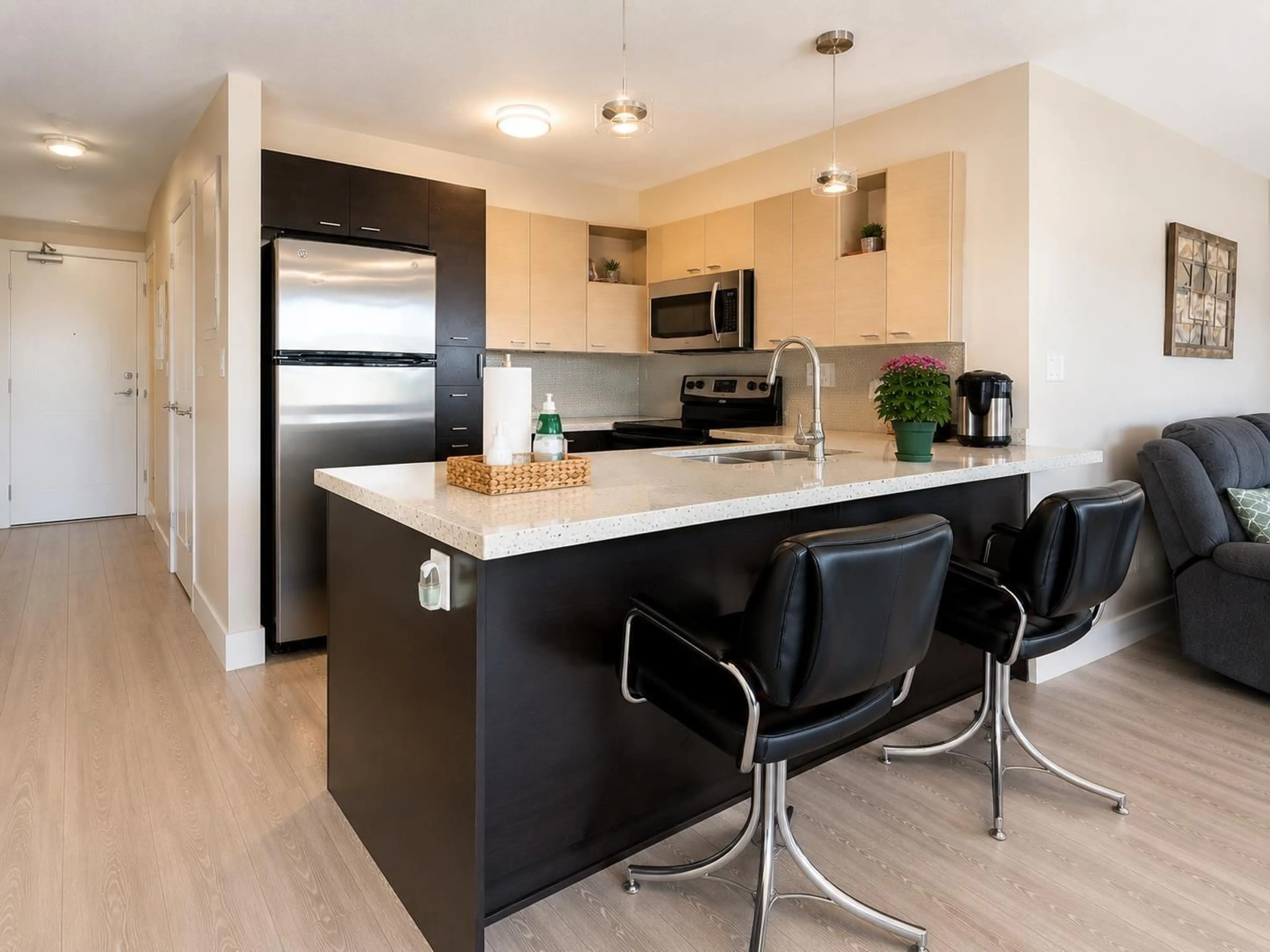 Open concept kitchen, wood/laminate floor for 306 - 7445 120 STREET, Delta British Columbia V4C0B3