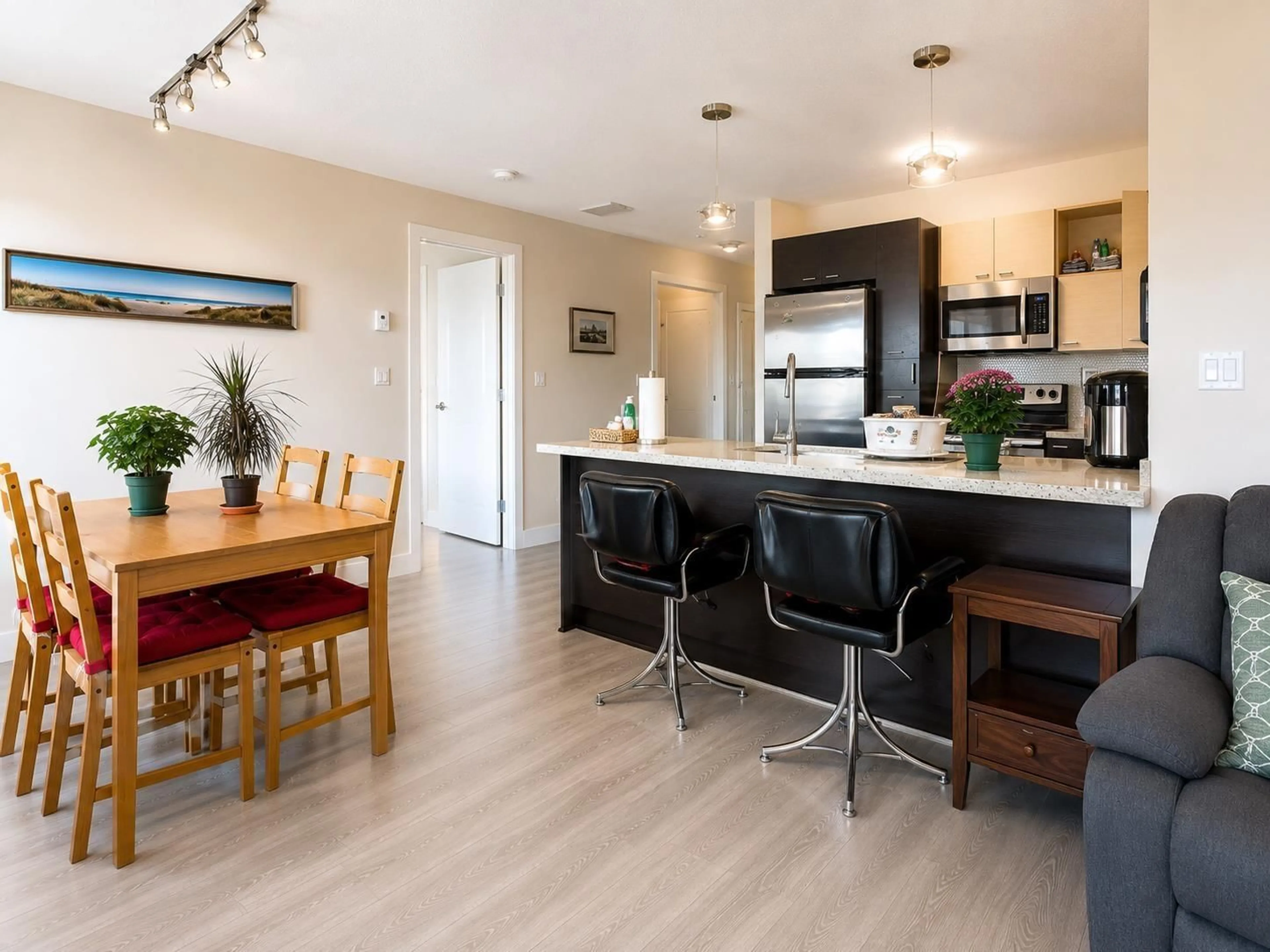 Open concept kitchen, wood/laminate floor for 306 - 7445 120 STREET, Delta British Columbia V4C0B3