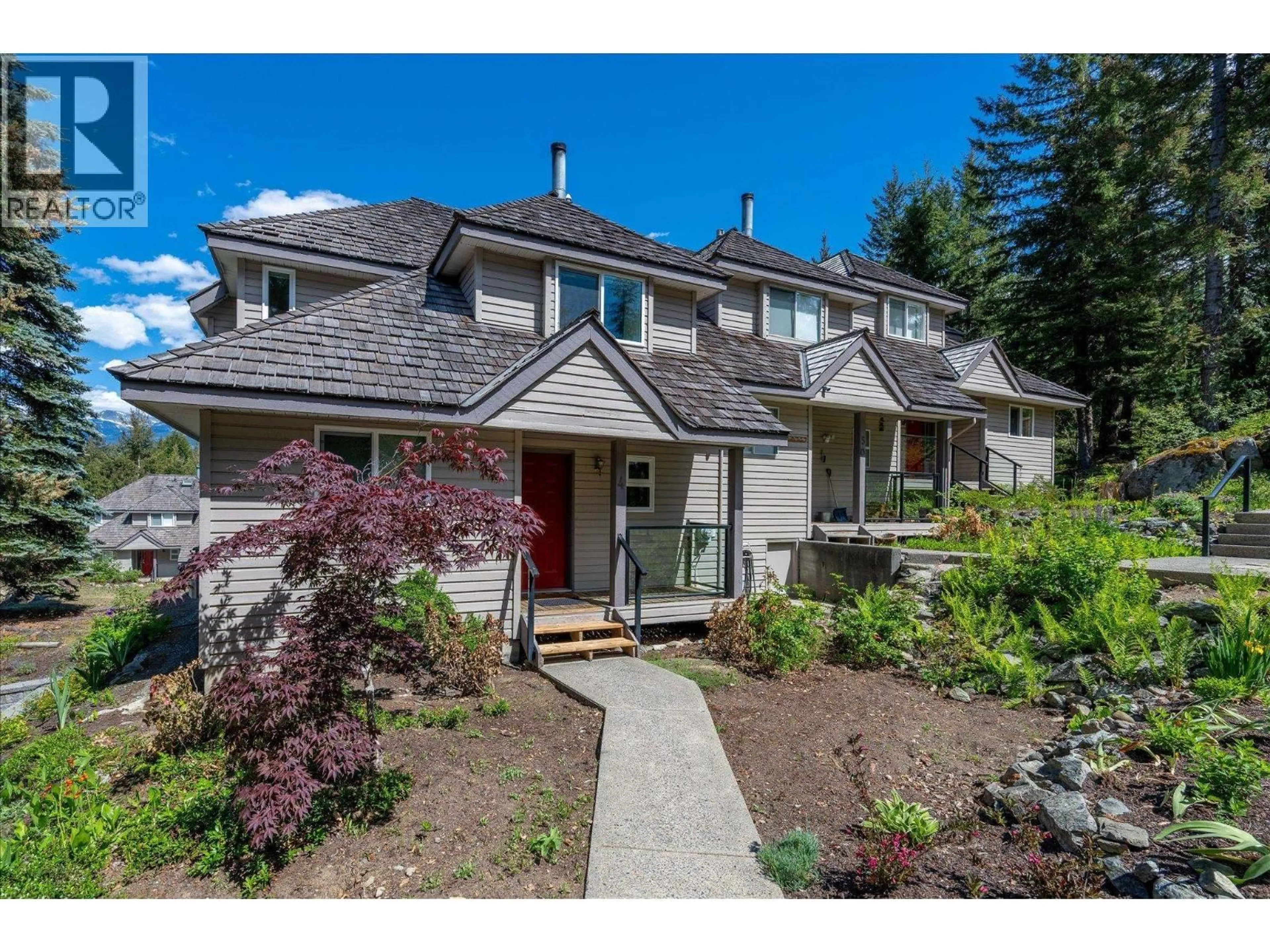 A pic from outside/outdoor area/front of a property/back of a property/a pic from drone, street for 4 - 2100 EVA LAKE ROAD, Whistler British Columbia V8E0A6