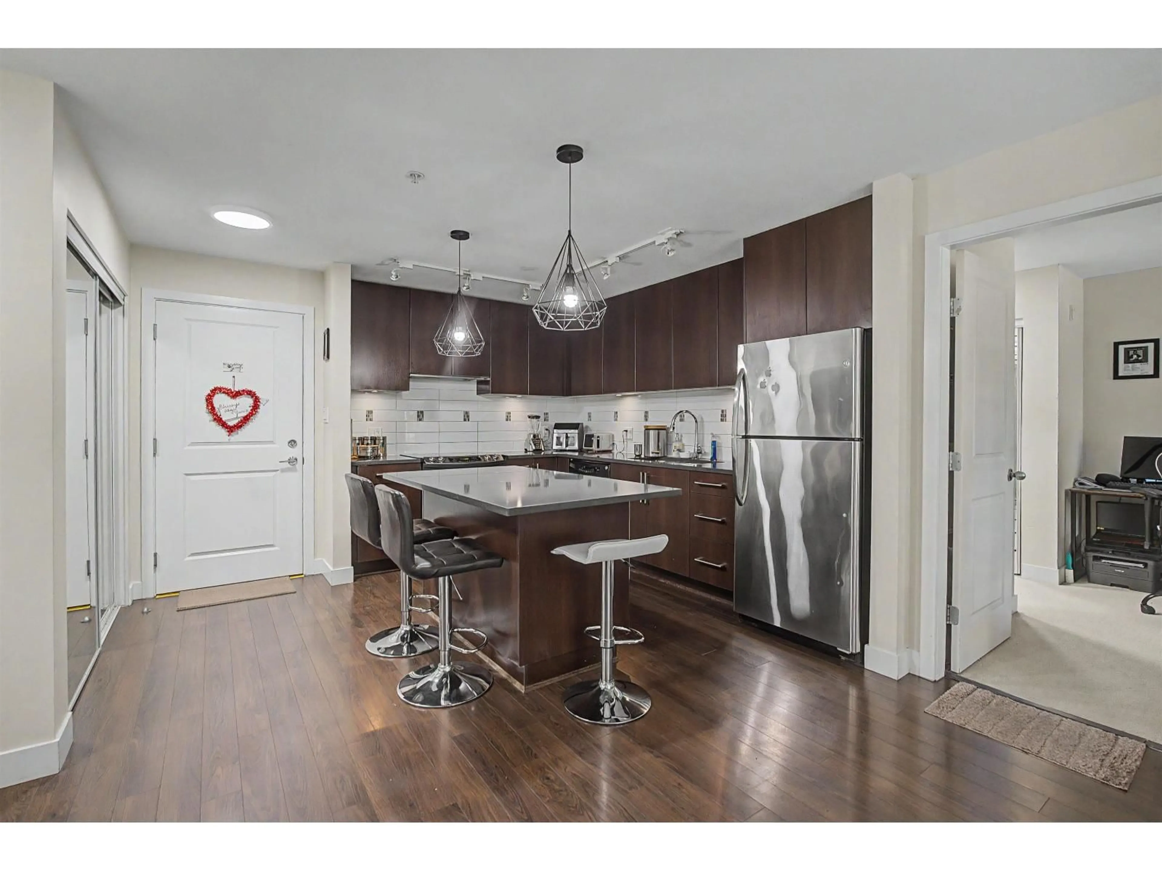 Open concept kitchen, wood/laminate floor for 252 - 15850 26 AVENUE, Surrey British Columbia V3S2N6