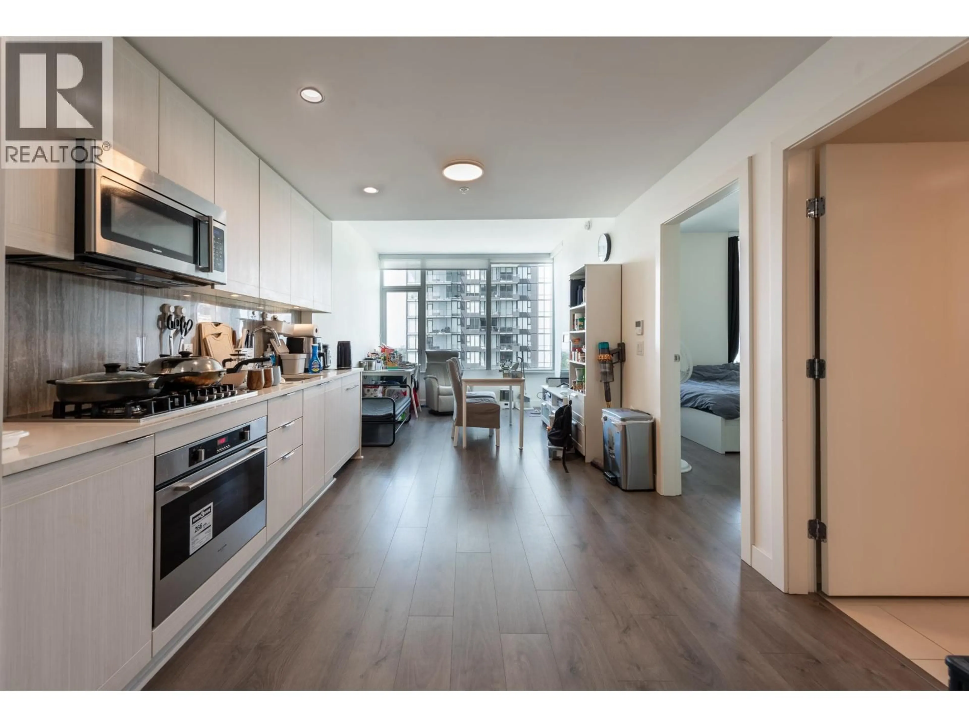 Open concept kitchen, wood/laminate floor for 1706 - 5051 IMPERIAL STREET, Burnaby British Columbia V5J0J3