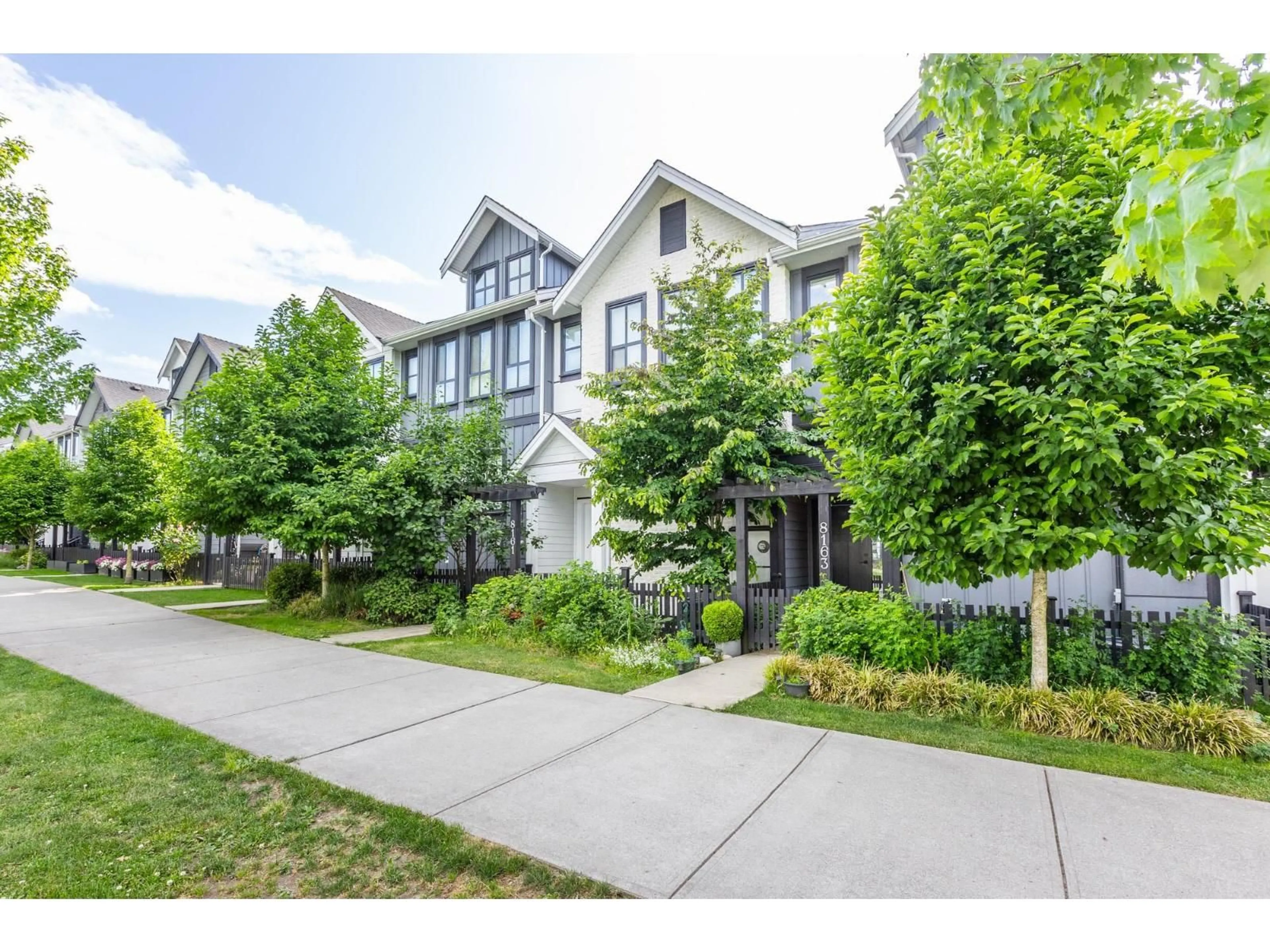 A pic from outside/outdoor area/front of a property/back of a property/a pic from drone, street for 8163 202 STREET, Langley British Columbia V2Y3K2