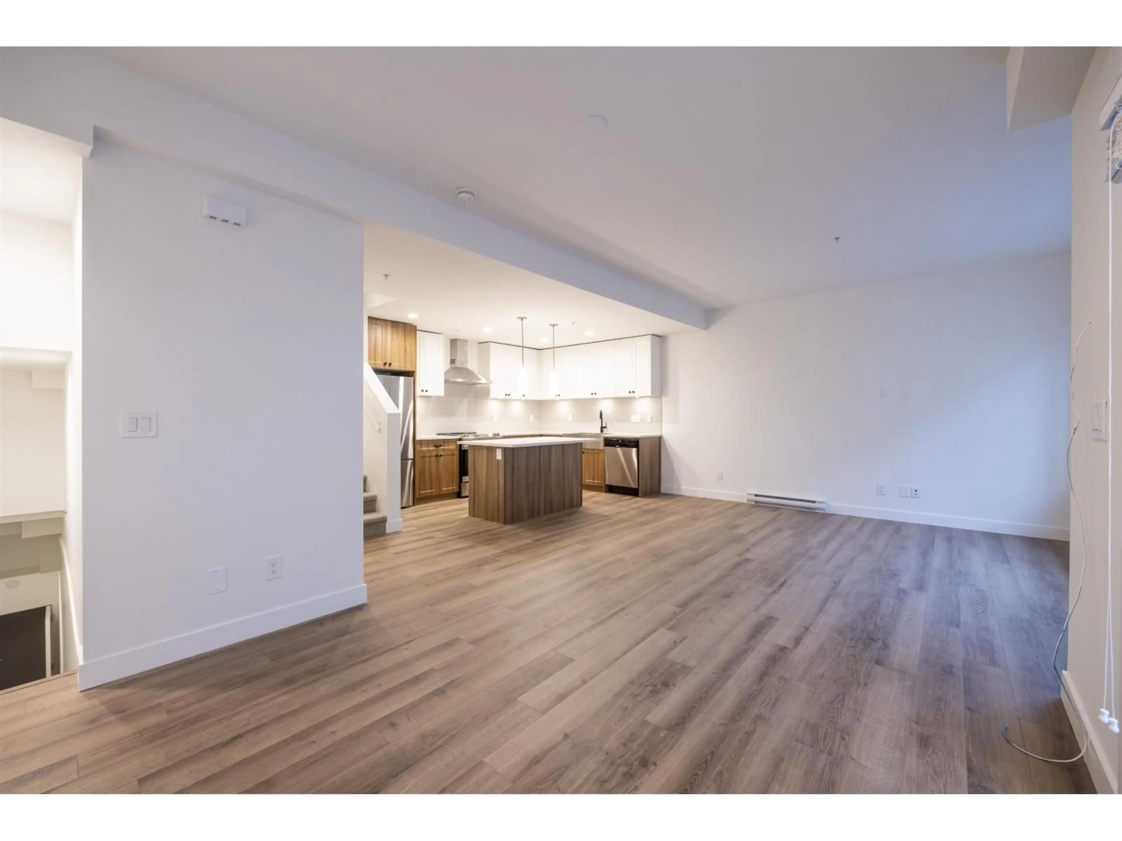 Open concept kitchen, wood/laminate floor for 81 - 20487 65 AVENUE, Langley British Columbia V2Y3K8